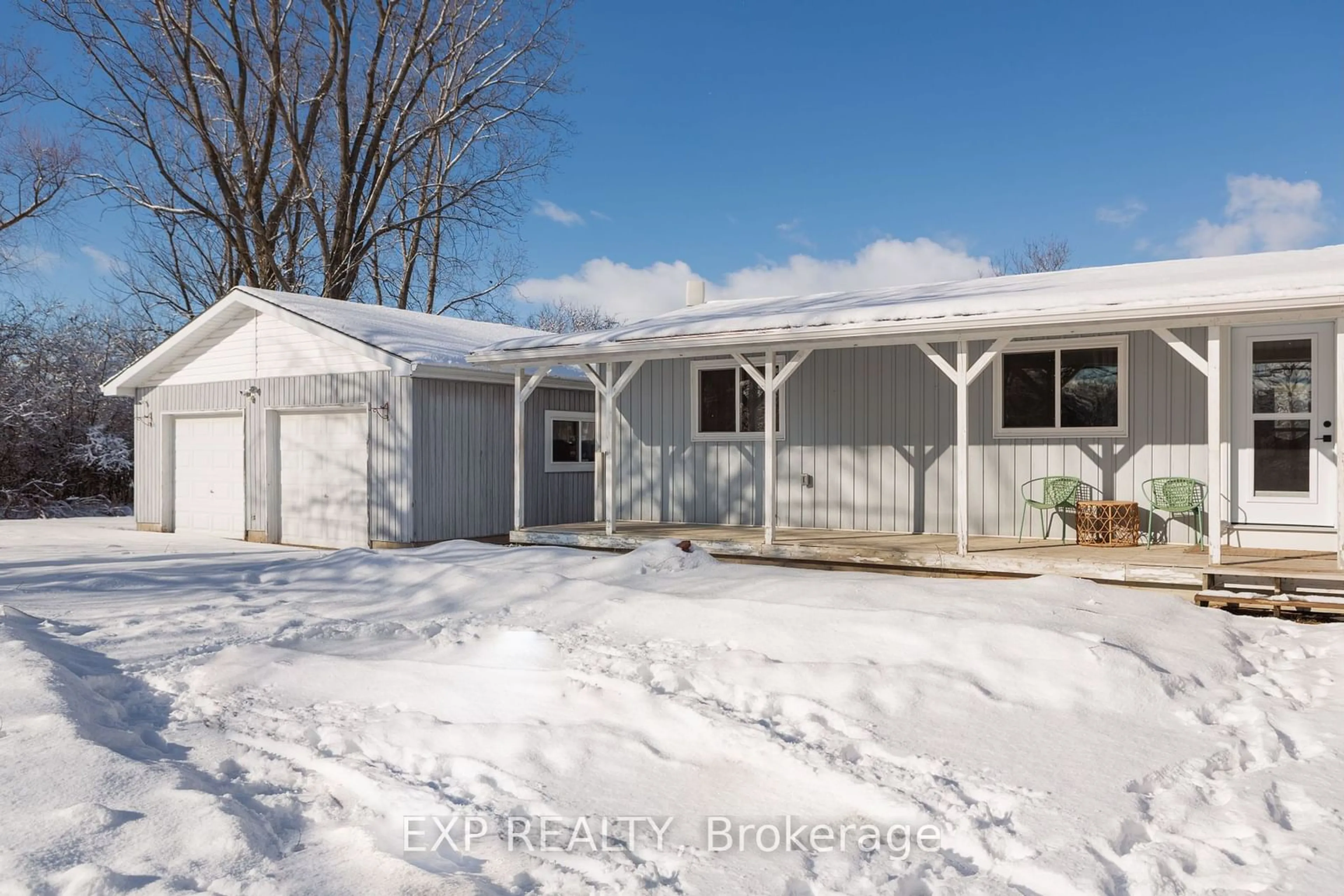 Home with vinyl exterior material, street for 825 County Road 8 Rd, Prince Edward County Ontario K0K 2T0