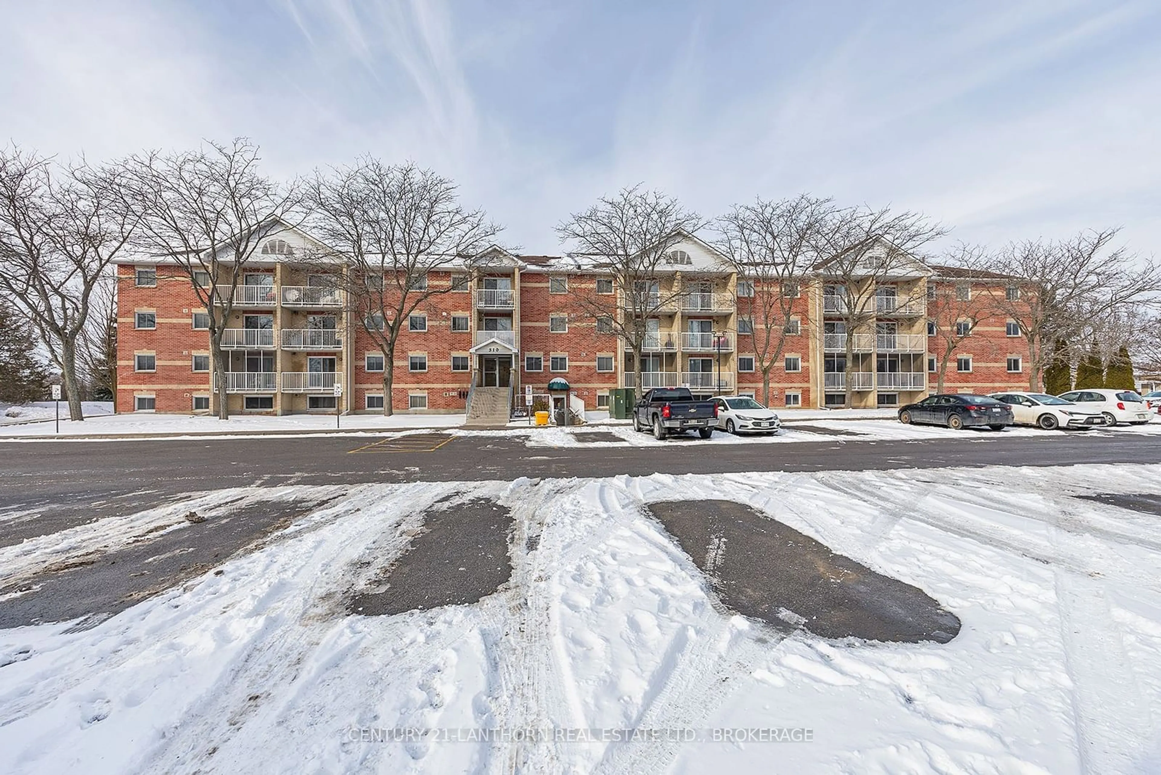 A pic from outside/outdoor area/front of a property/back of a property/a pic from drone, street for 310 Kingsdale Ave #204, Kingston Ontario K7M 8S1