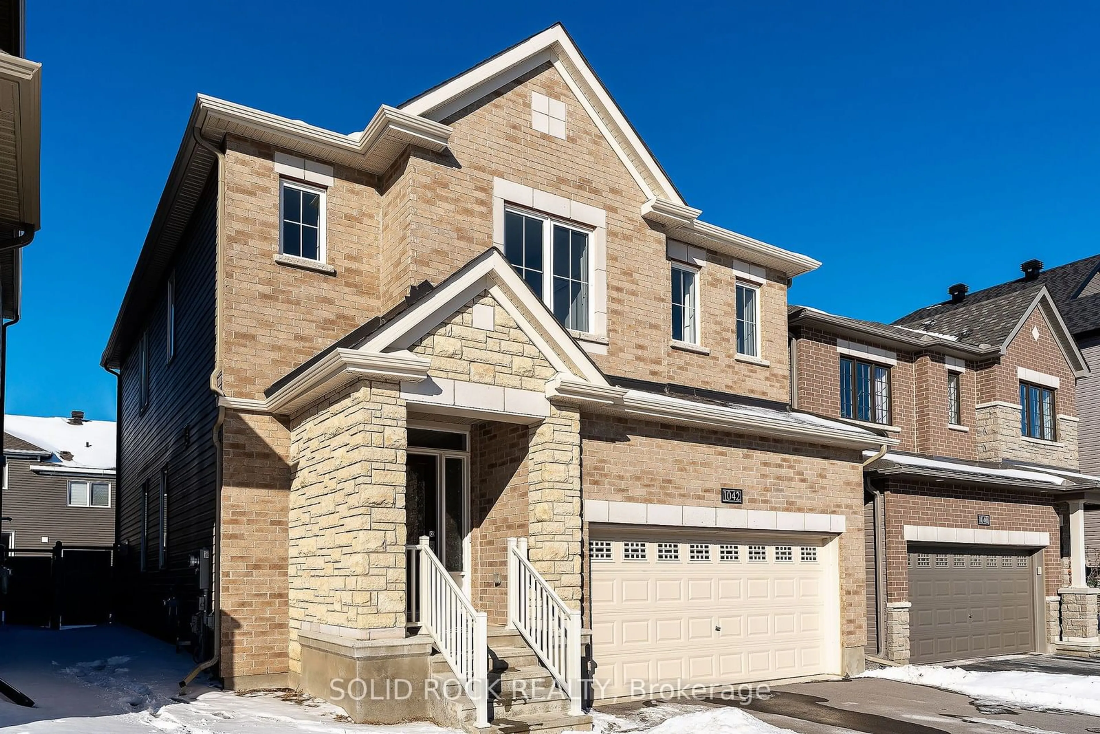 Home with brick exterior material, street for 1042 Kilbirnie Dr, Barrhaven Ontario K2J 6E6