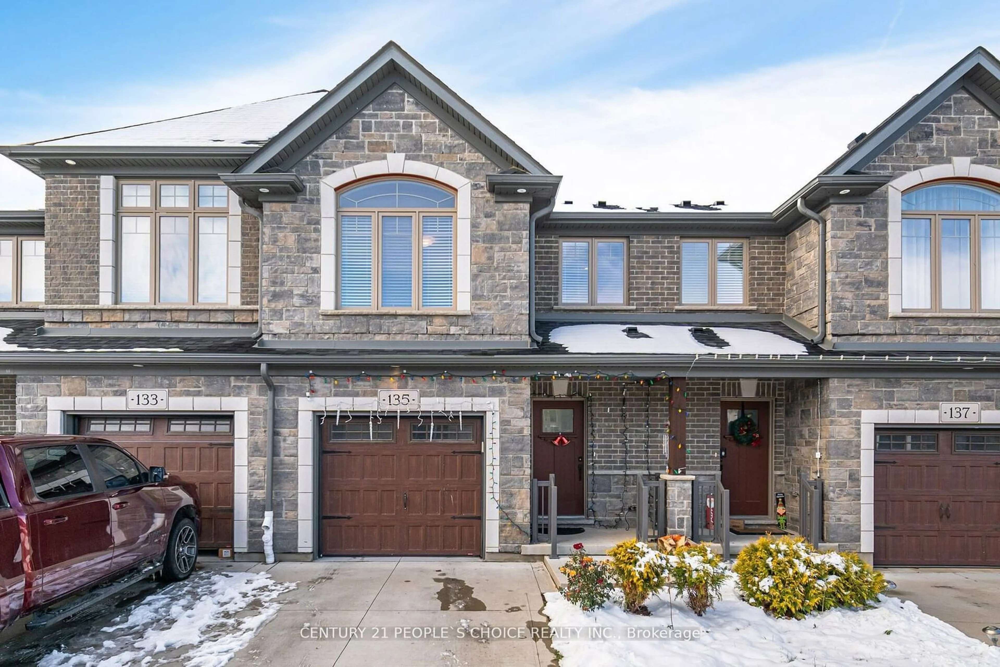 Home with brick exterior material, street for 135 Hollybrook Tr, Kitchener Ontario N2R 0P1