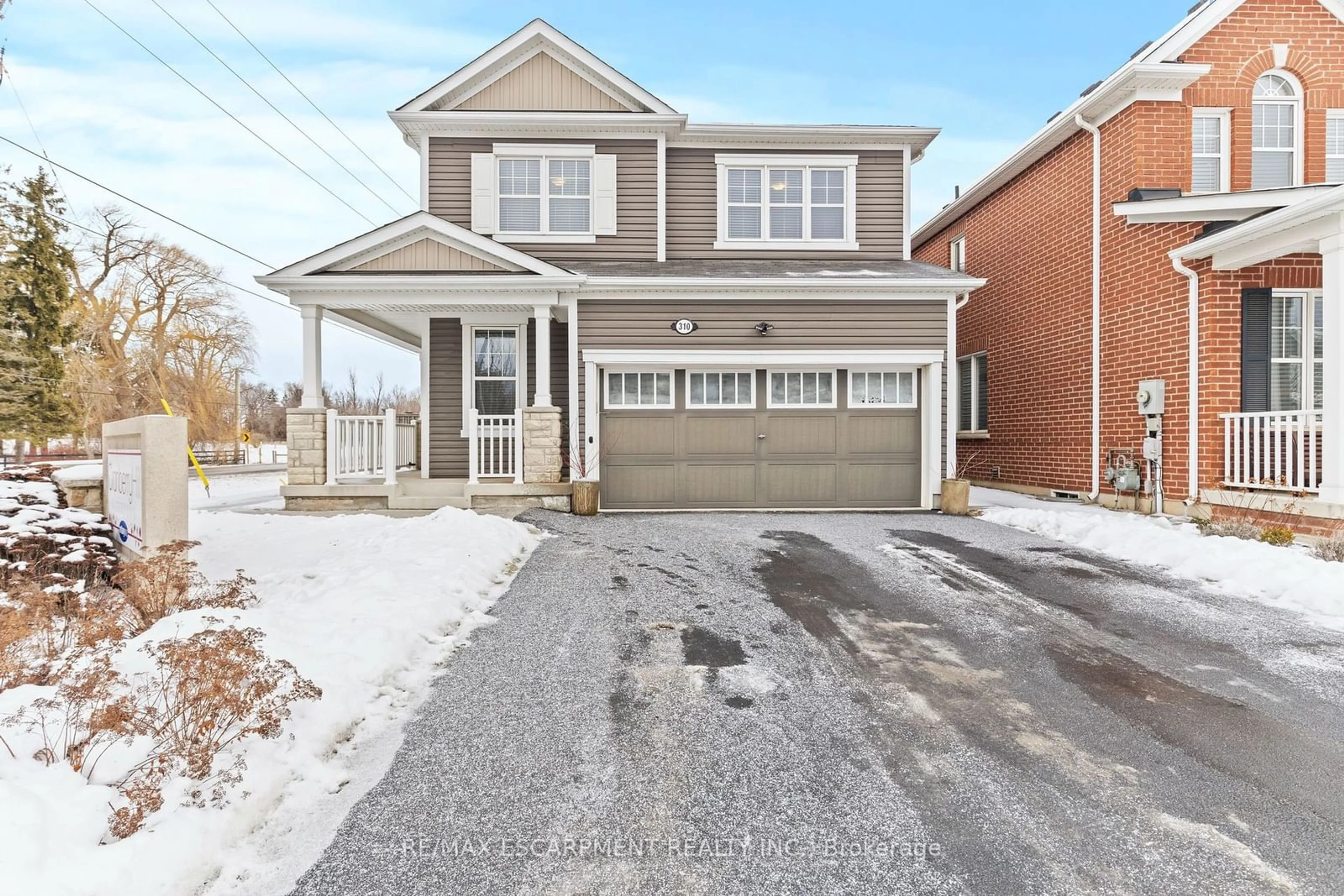 Home with brick exterior material, street for 310 Spring Creek Dr, Hamilton Ontario L8B 0Y5