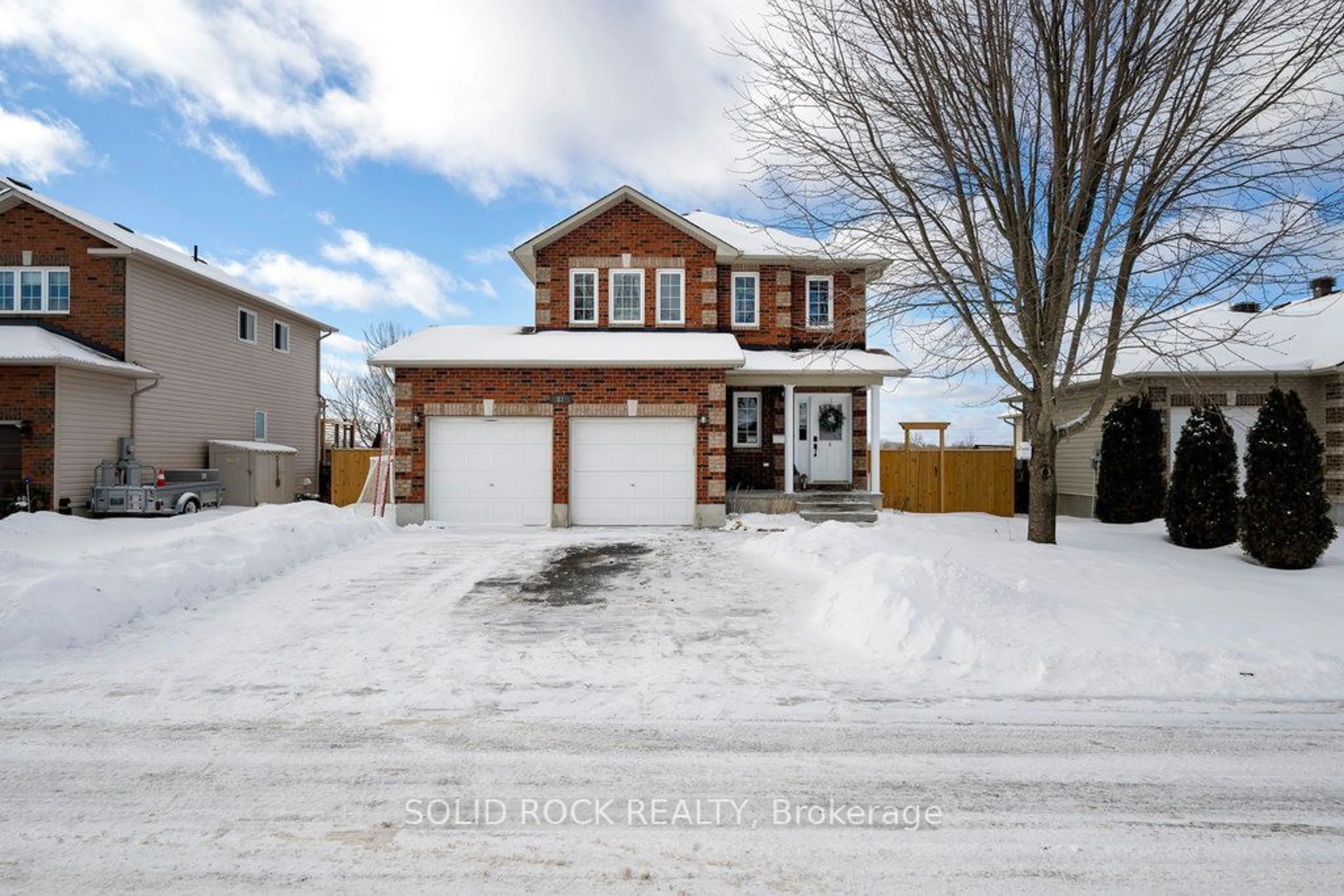 Home with brick exterior material, street for 83 Comba Dr, Carleton Place Ontario K7C 4V2