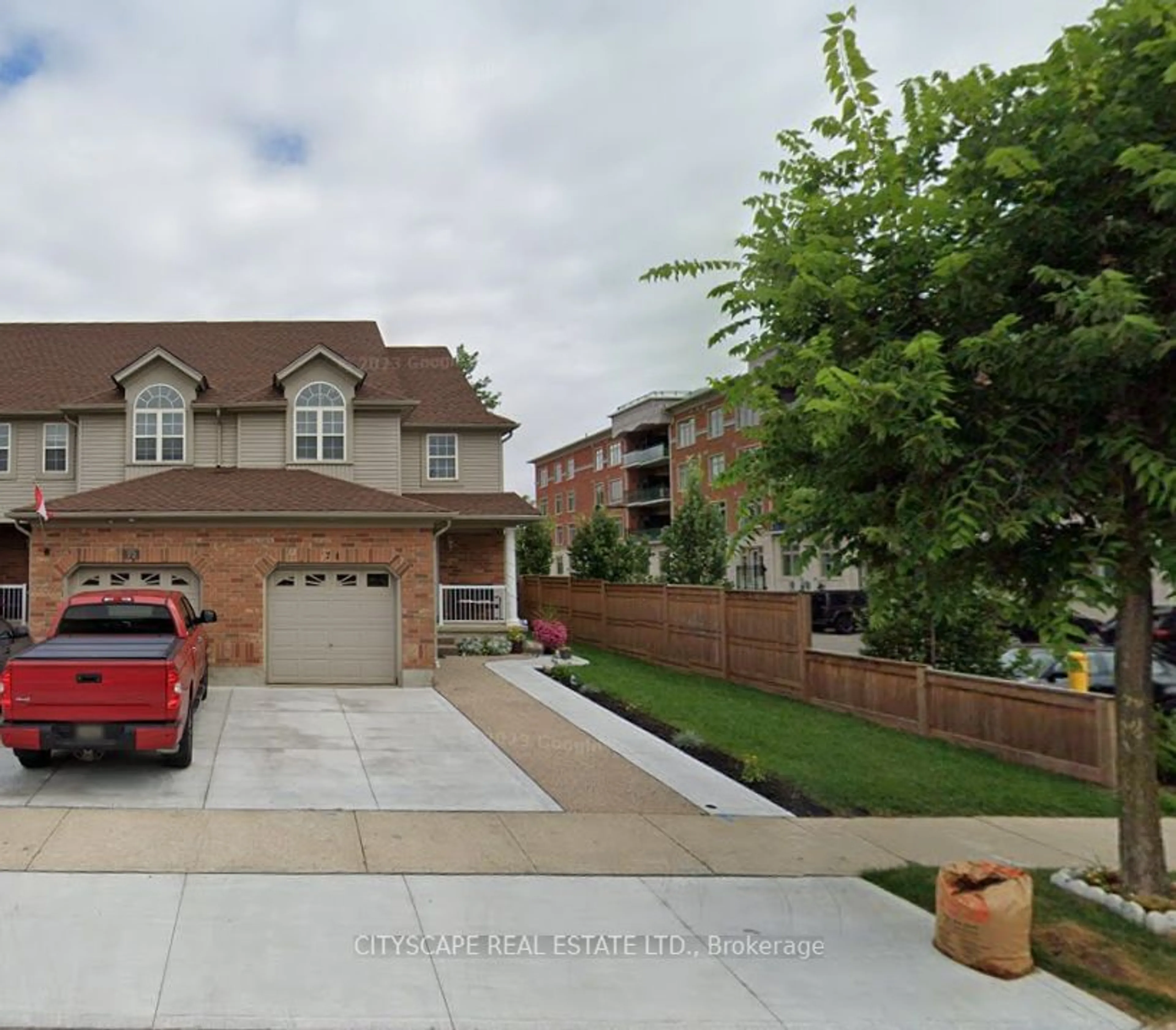 Home with brick exterior material, street for 74 Swartz St, Kitchener Ontario N2E 4A6