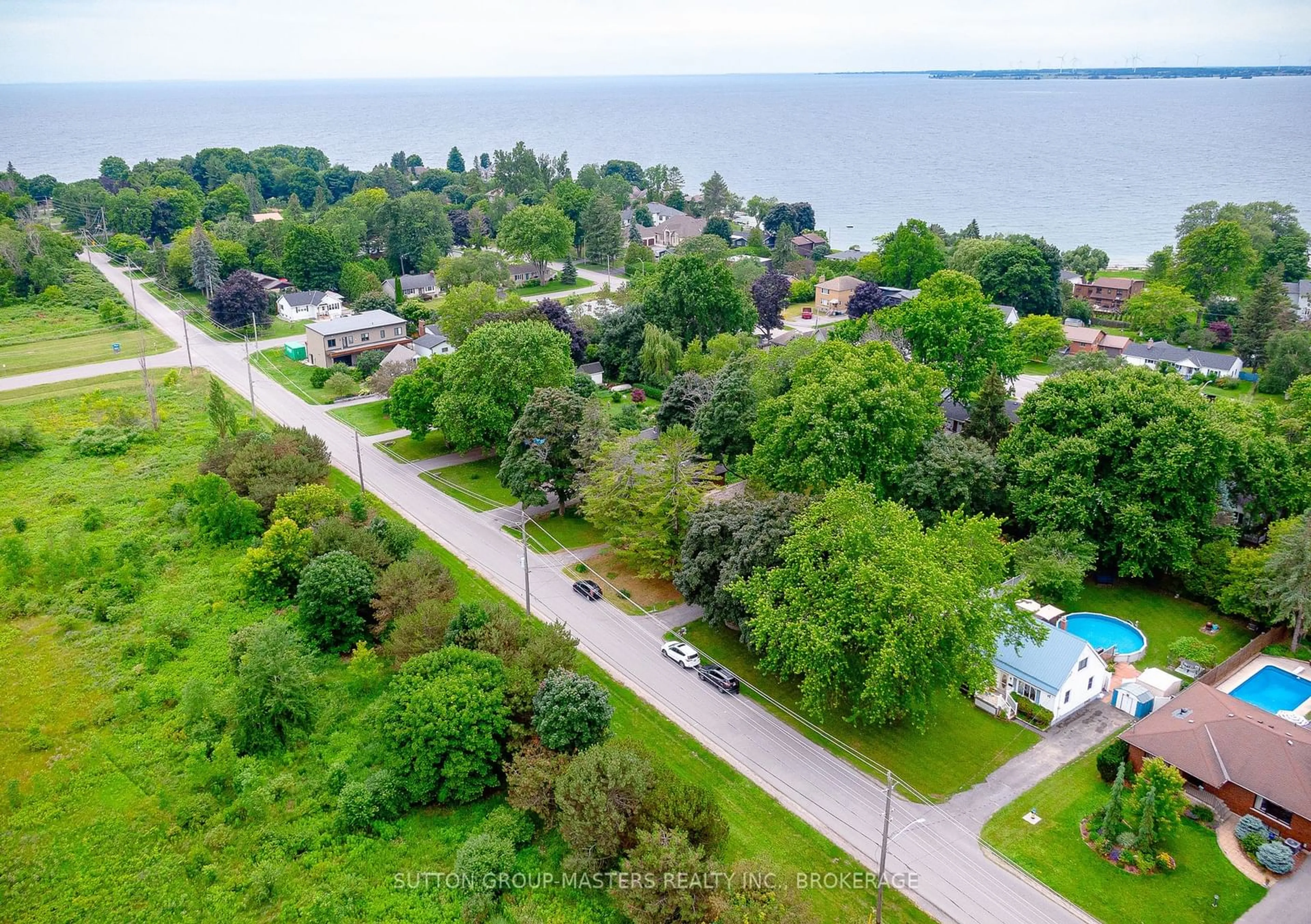 A pic from outside/outdoor area/front of a property/back of a property/a pic from drone, water/lake/river/ocean view for 49 SUNNY ACRES Rd, Kingston Ontario K7M 3N3