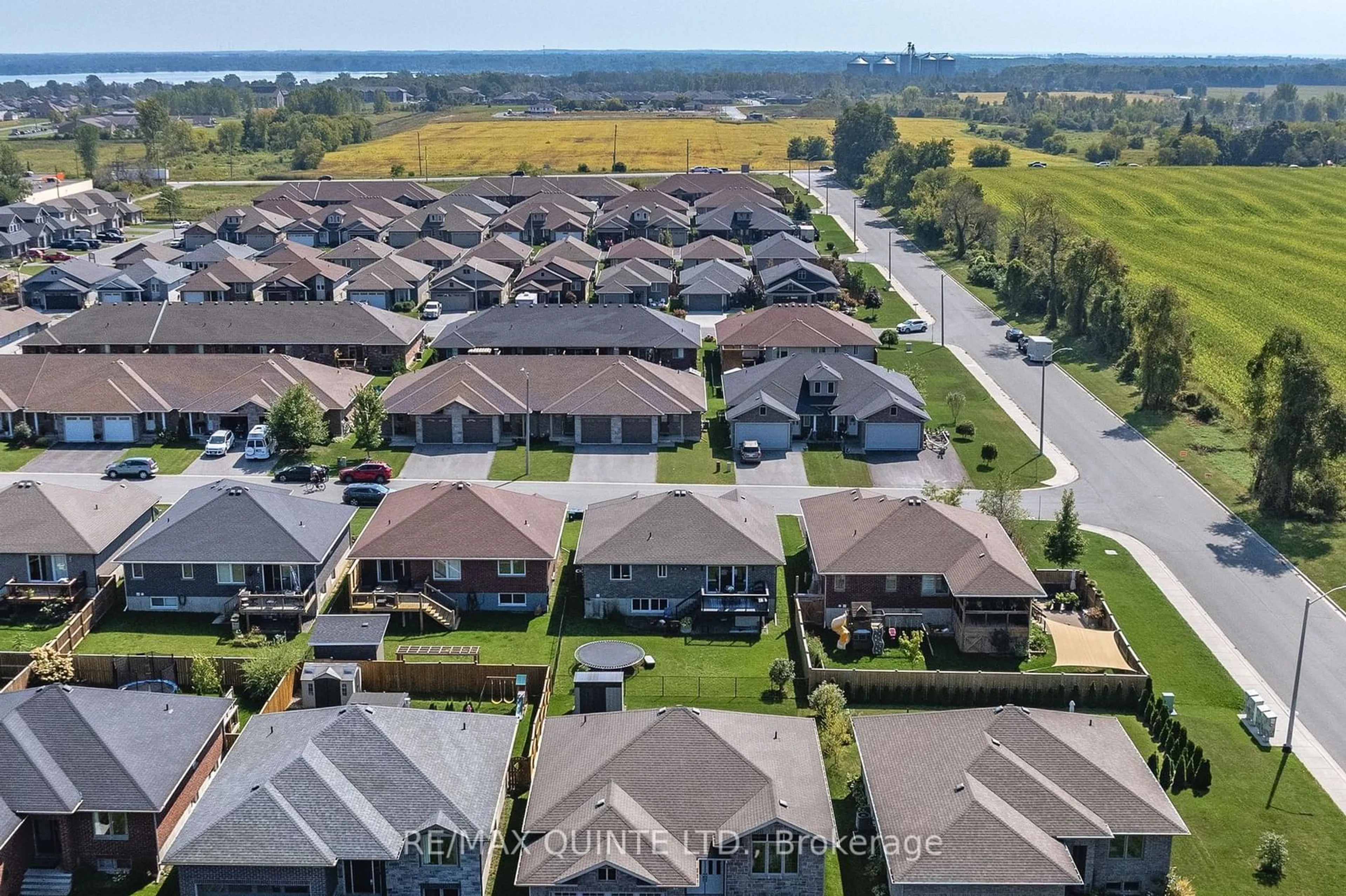 A pic from outside/outdoor area/front of a property/back of a property/a pic from drone, water/lake/river/ocean view for 56 Mcintosh Cres, Quinte West Ontario K8V 0G1