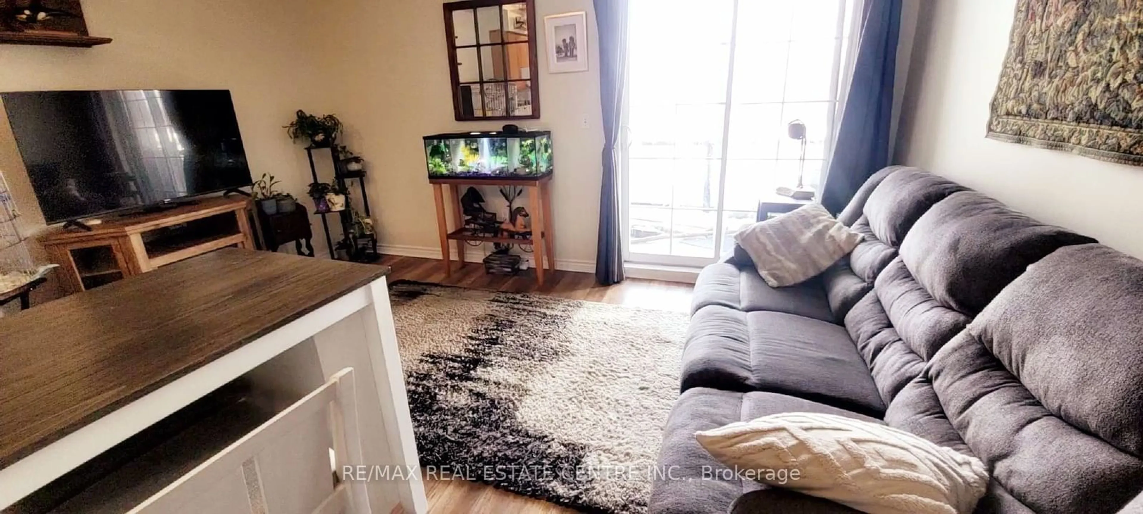 Living room with furniture, unknown for 308 Watson Pkwy #118, Guelph Ontario N1E 0G7