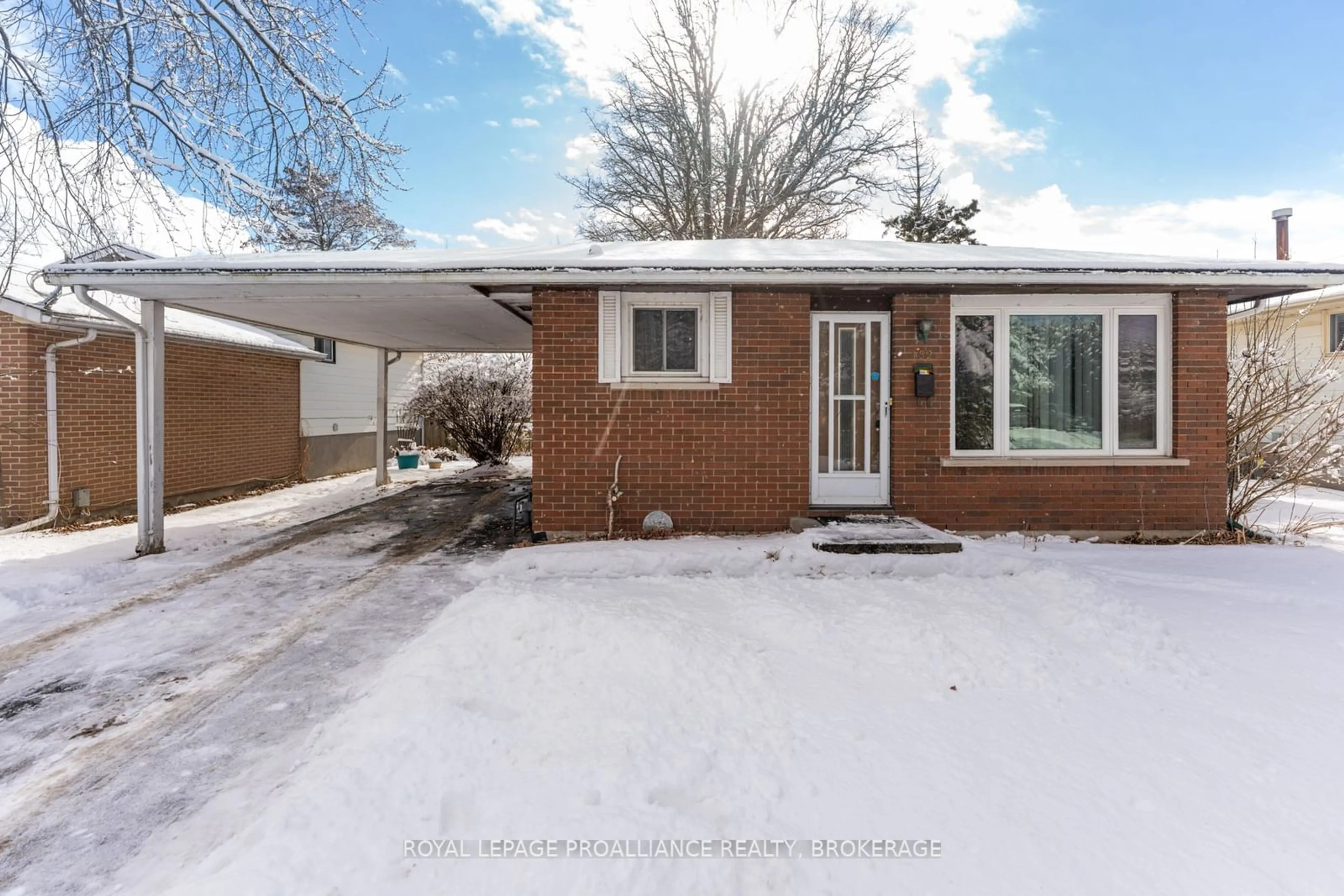 Home with brick exterior material, street for 152 Calderwood Dr, Kingston Ontario K7M 6M3