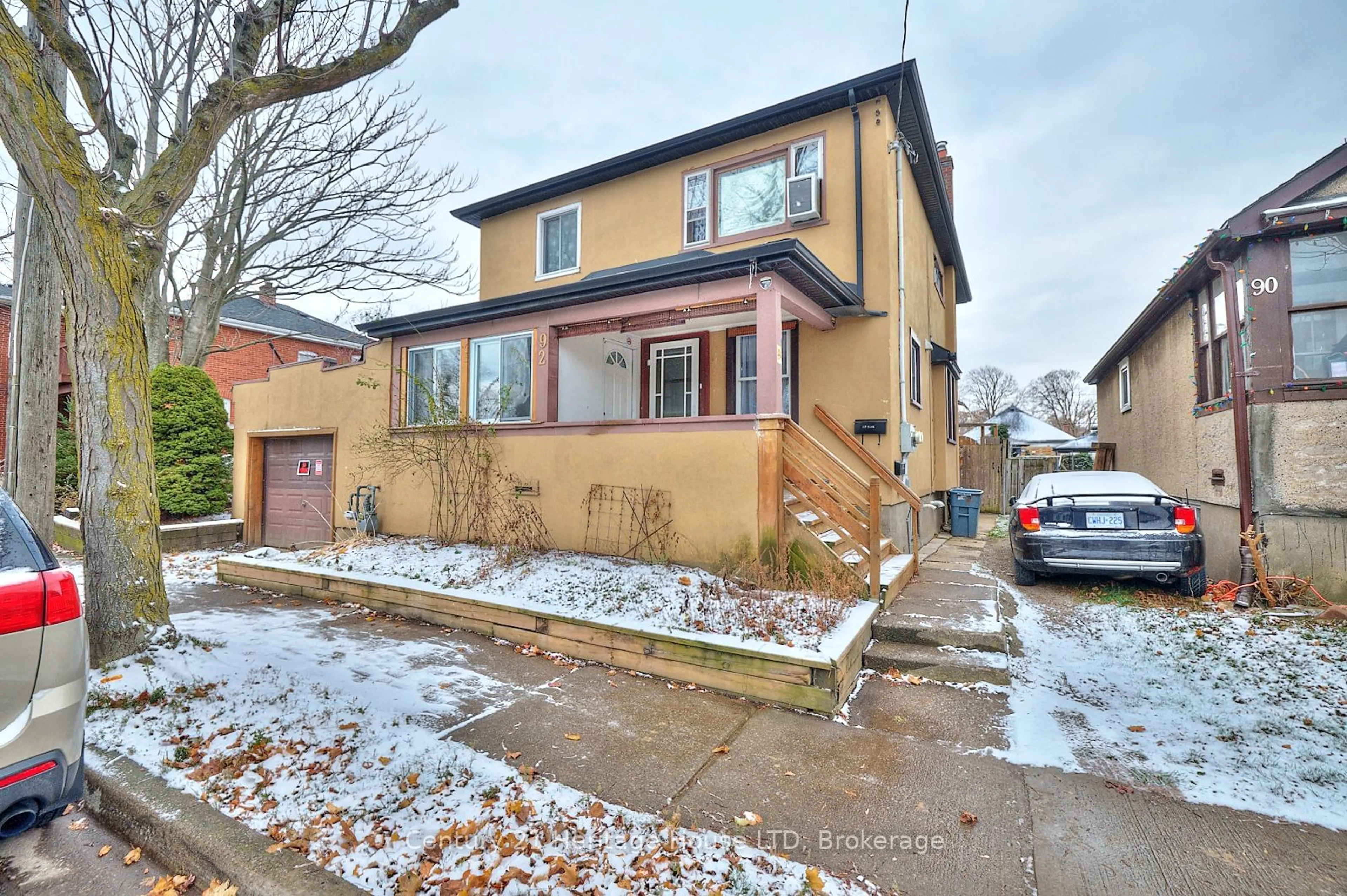 Home with brick exterior material, street for 92 Carlton St, St. Catharines Ontario L2R 1P8
