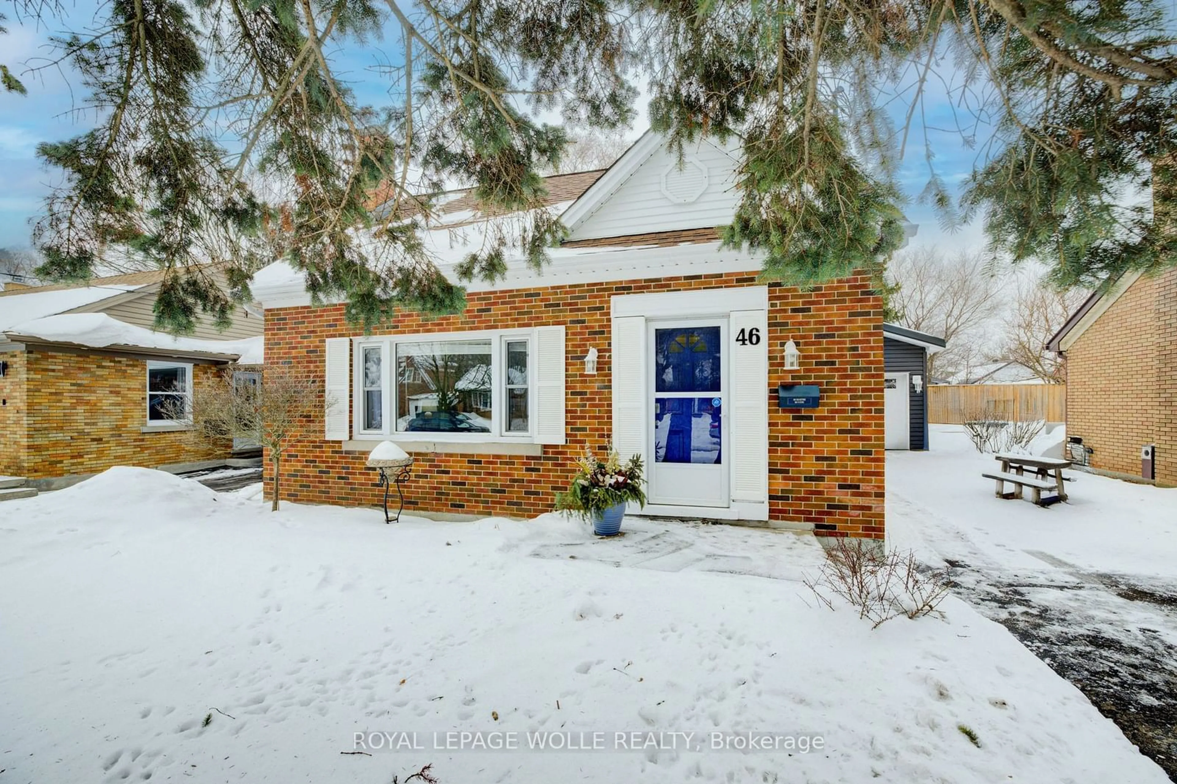 Home with brick exterior material, street for 46 Crestwood Ave, Kitchener Ontario N2H 4K7