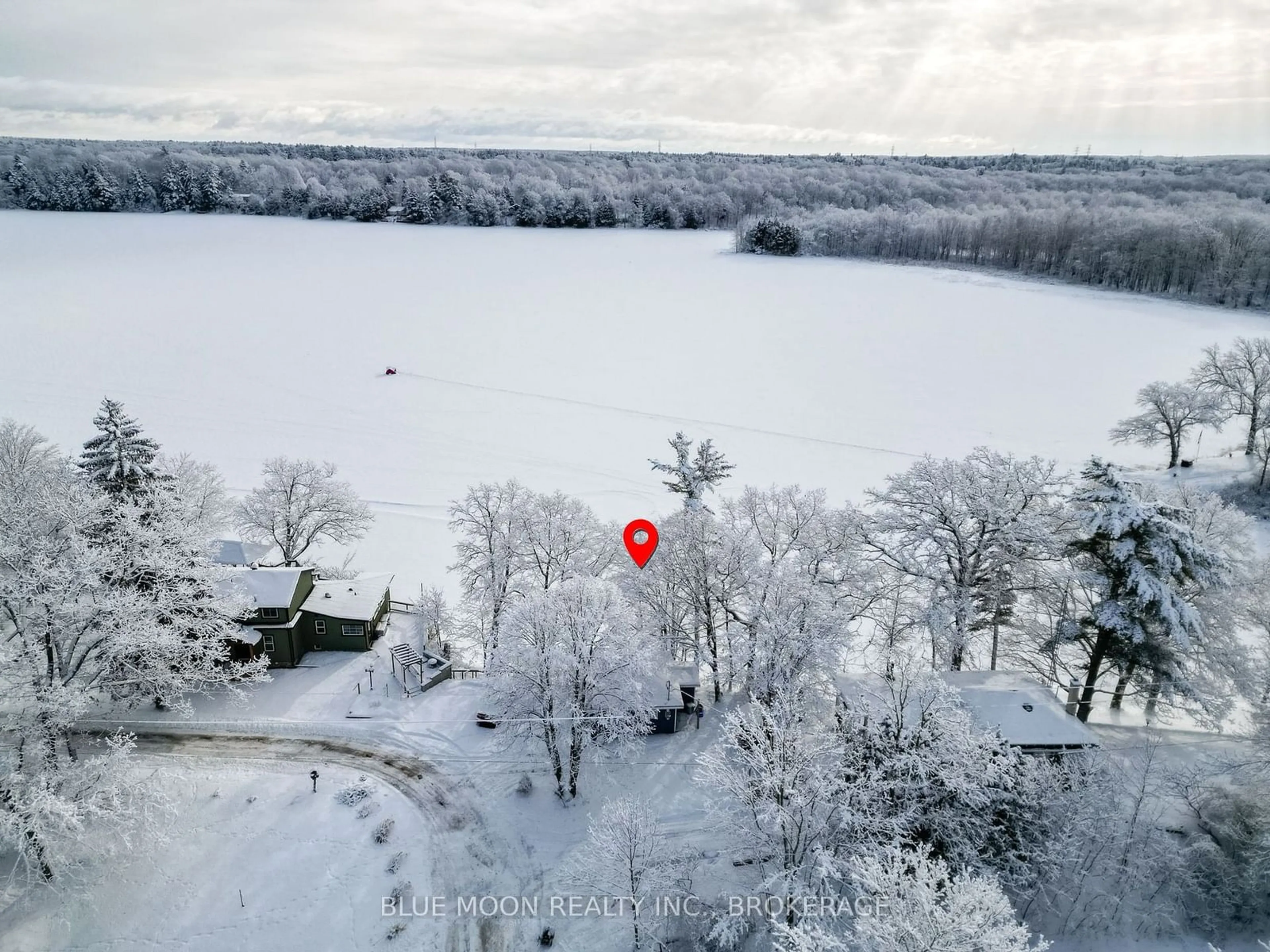 A pic from outside/outdoor area/front of a property/back of a property/a pic from drone, water/lake/river/ocean view for 1004 Masonville Lane, South Frontenac Ontario K0H 2W0