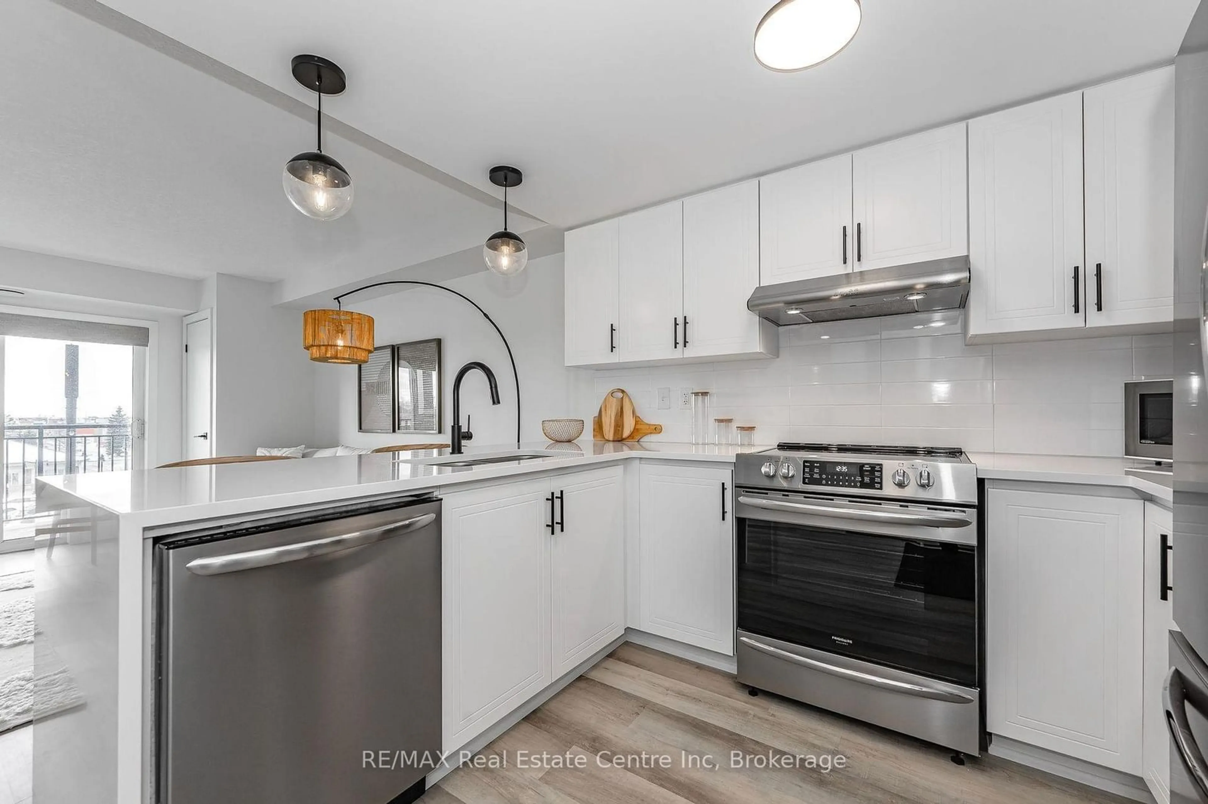 Open concept kitchen, ceramic/tile floor for 45 Goodwin Dr #403, Guelph Ontario N1L 0E9