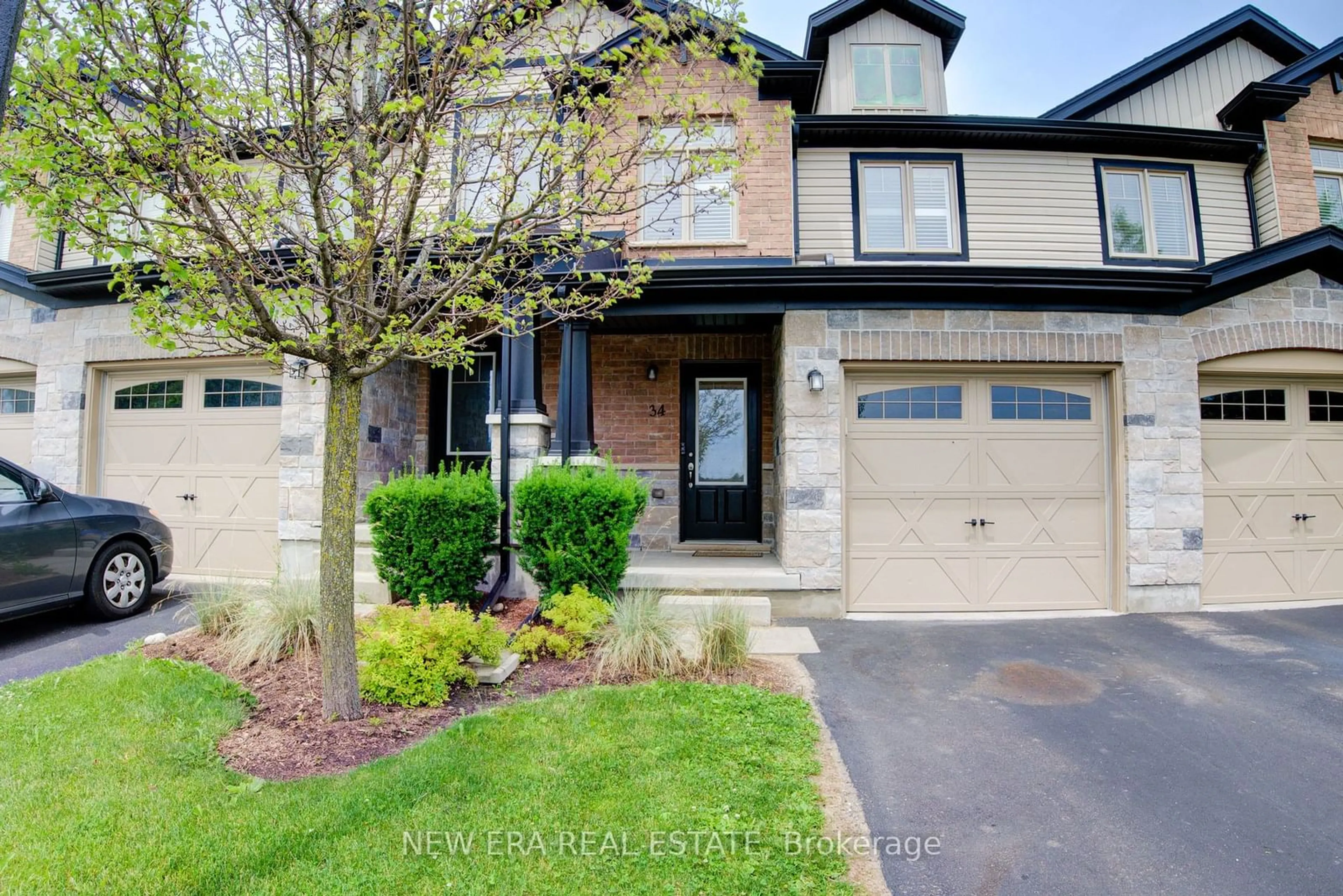 Home with brick exterior material, street for 34 Arlington Cres, Guelph Ontario N1L 0L1