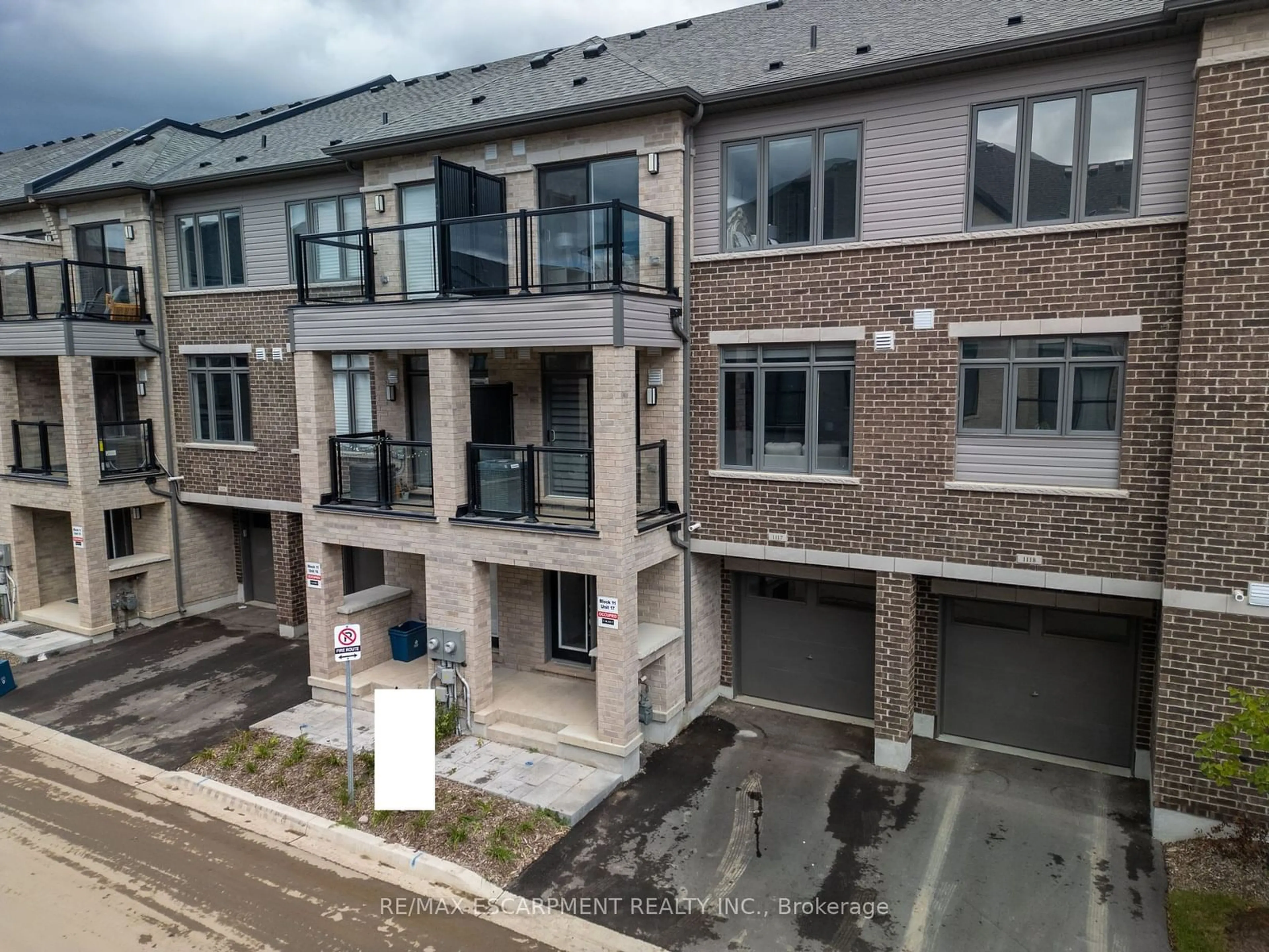 A pic from outside/outdoor area/front of a property/back of a property/a pic from drone, street for 585 Colborne St #11-17, Brantford Ontario N3S 0K4