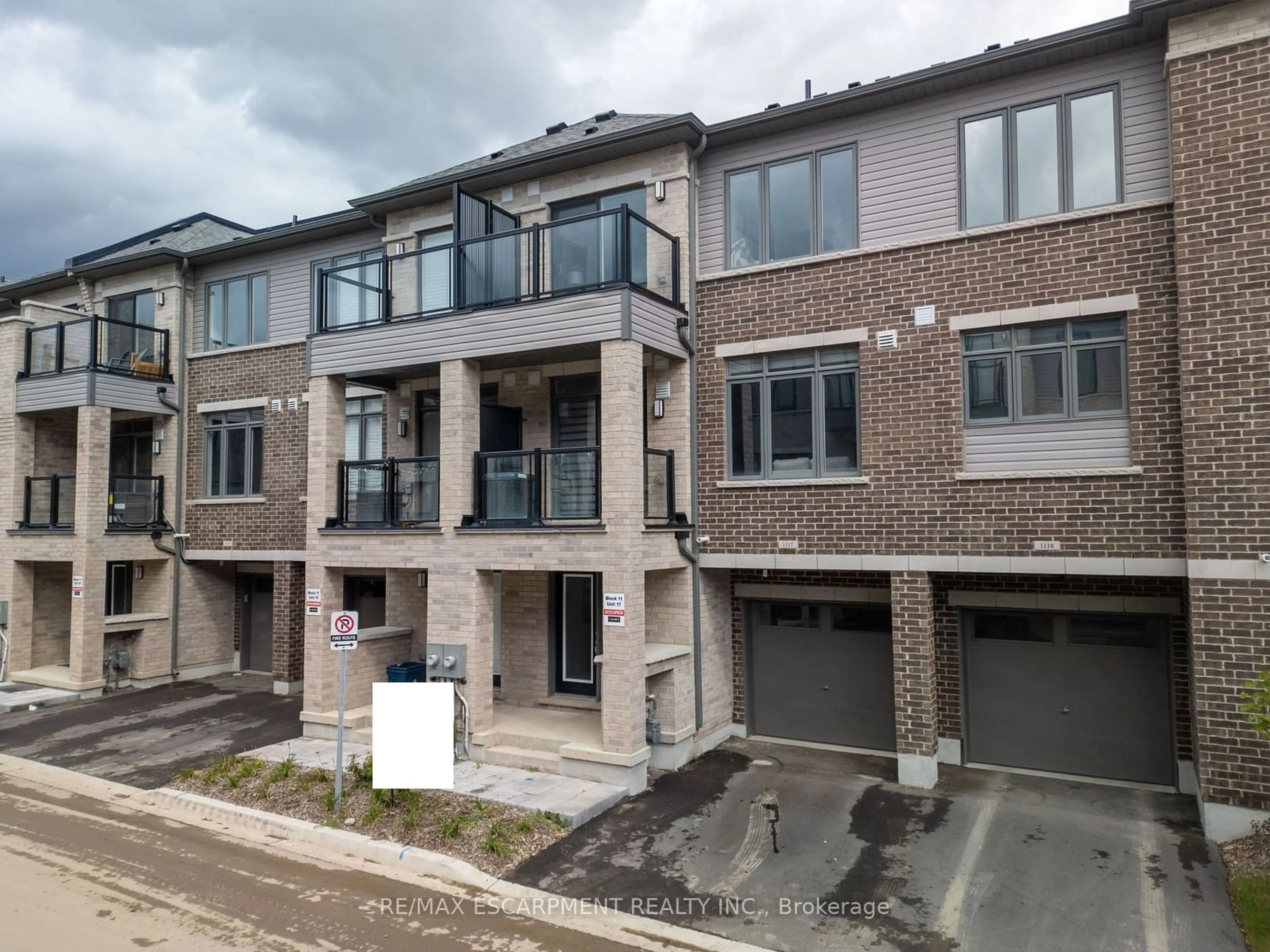 A pic from outside/outdoor area/front of a property/back of a property/a pic from drone, street for 585 Colborne St #11-17, Brantford Ontario N3S 0K4