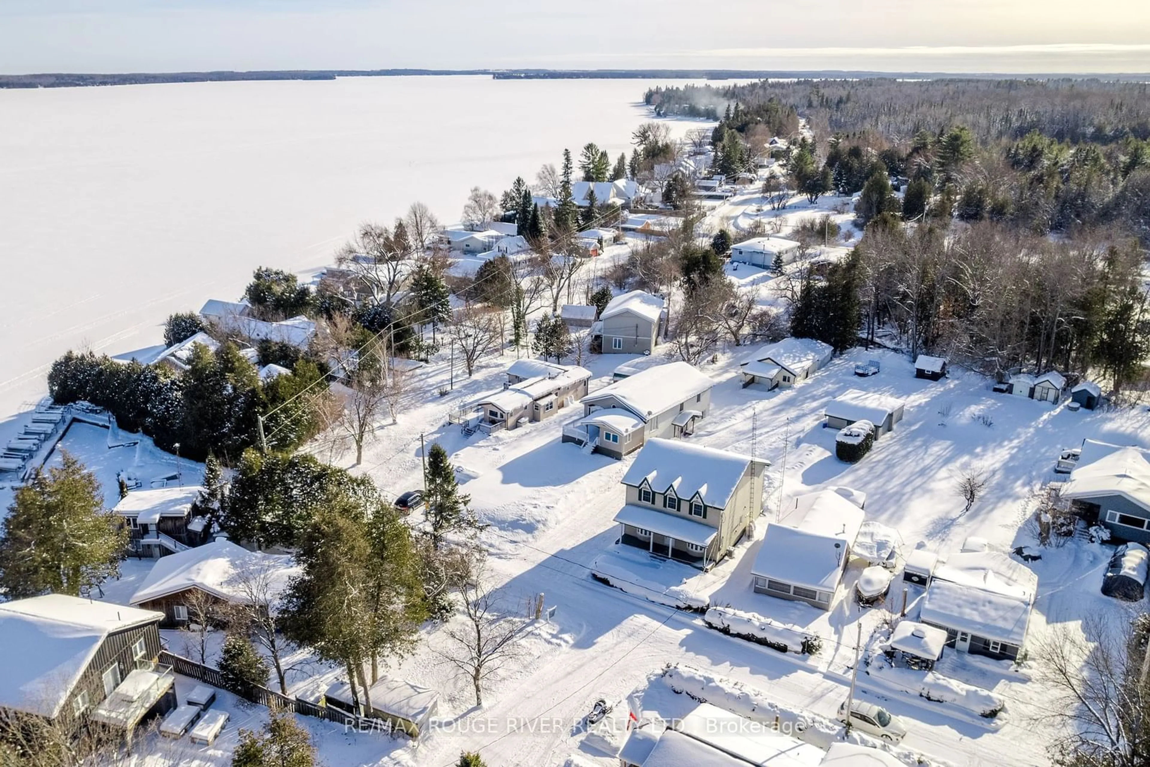 A pic from outside/outdoor area/front of a property/back of a property/a pic from drone, water/lake/river/ocean view for 24 Cedar Dale Dr, Kawartha Lakes Ontario K0M 2B0