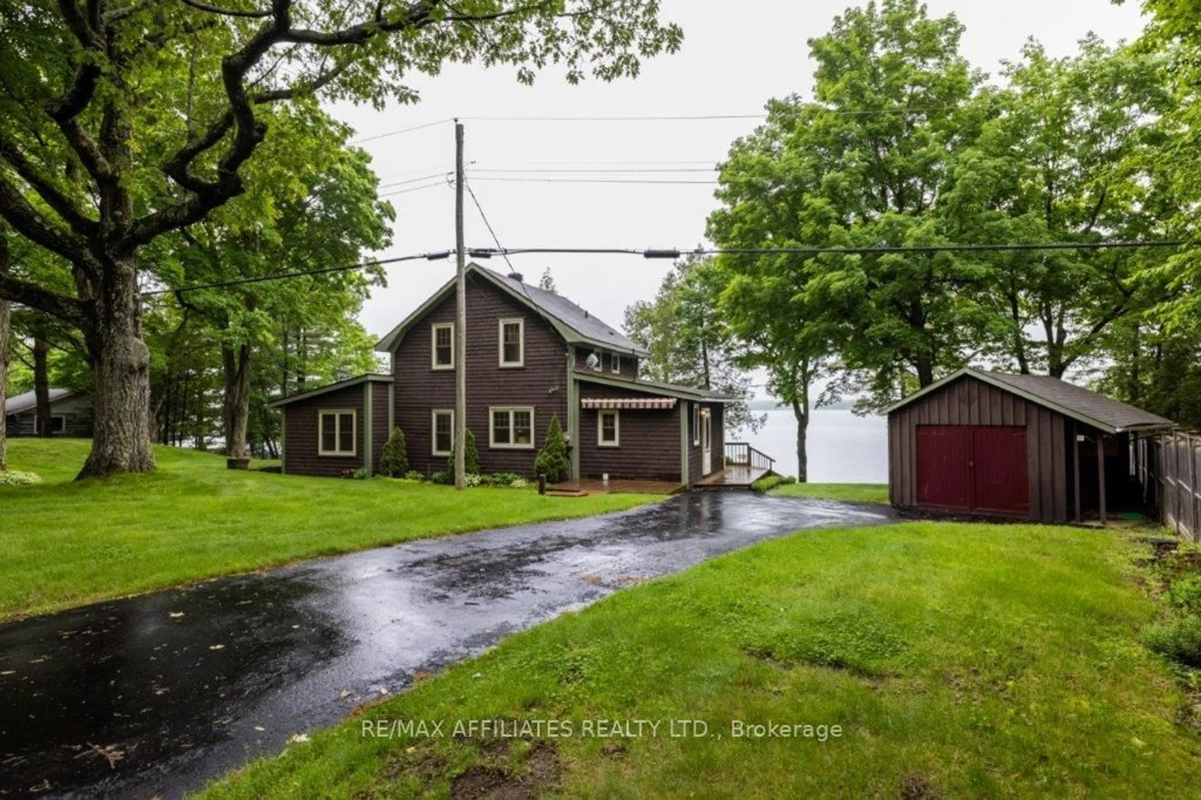 A pic from outside/outdoor area/front of a property/back of a property/a pic from drone, street for 54 R5 Rd, Rideau Lakes Ontario K0G 1L0