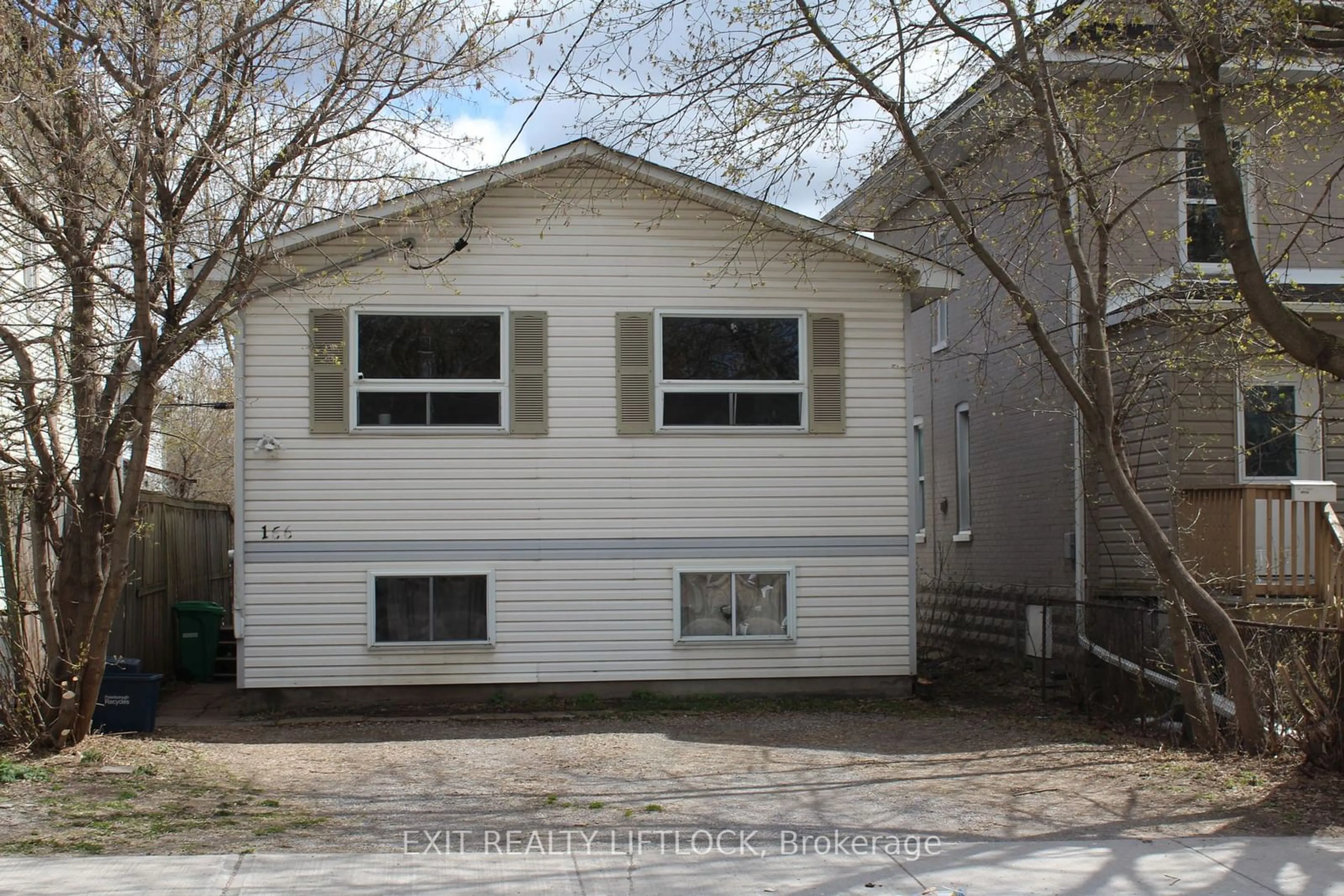 Home with vinyl exterior material, street for 166 Stewart St, Peterborough Ontario K9J 3M5