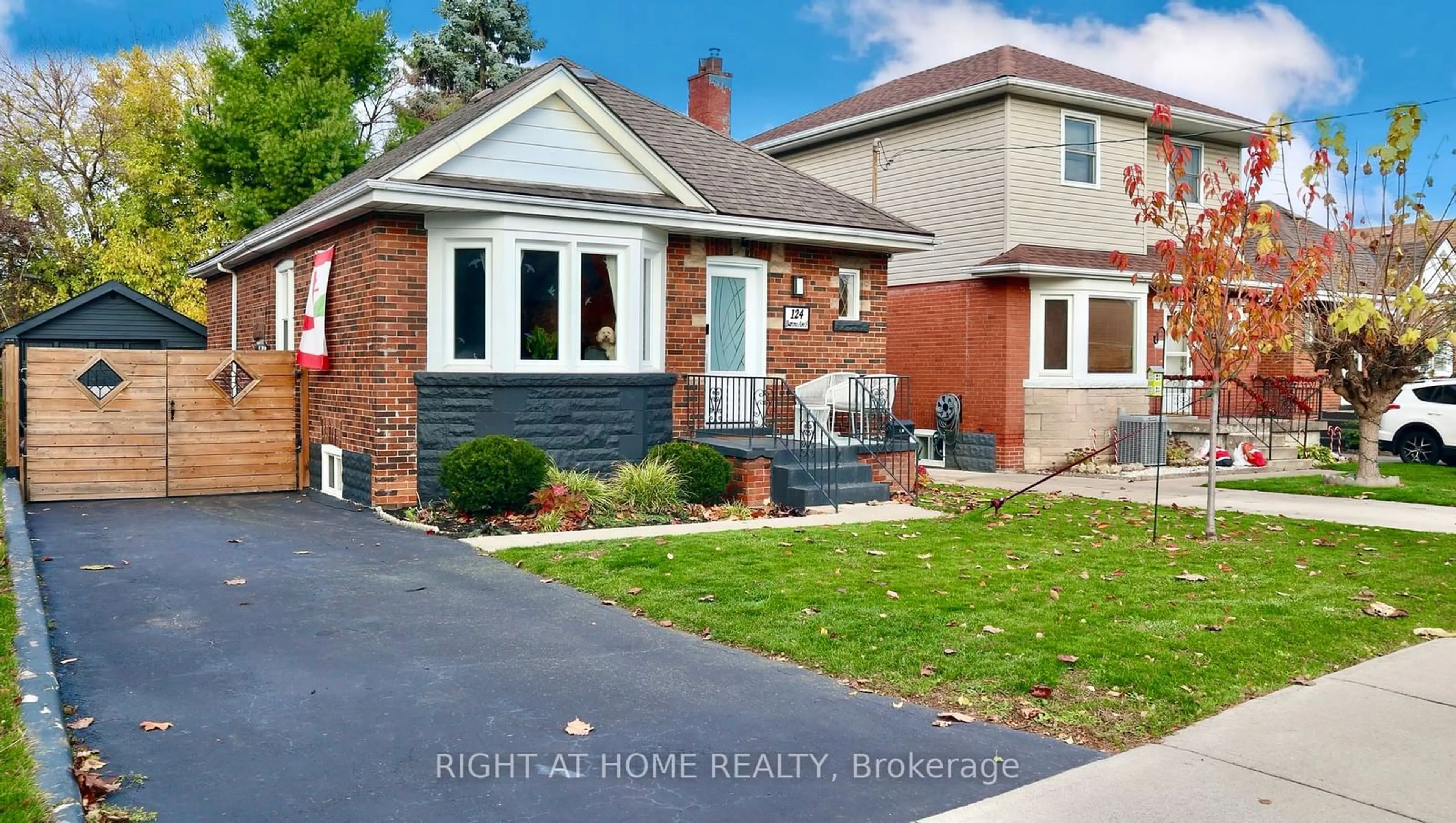 Home with brick exterior material, street for 124 Barons Ave, Hamilton Ontario L8K 2Y7