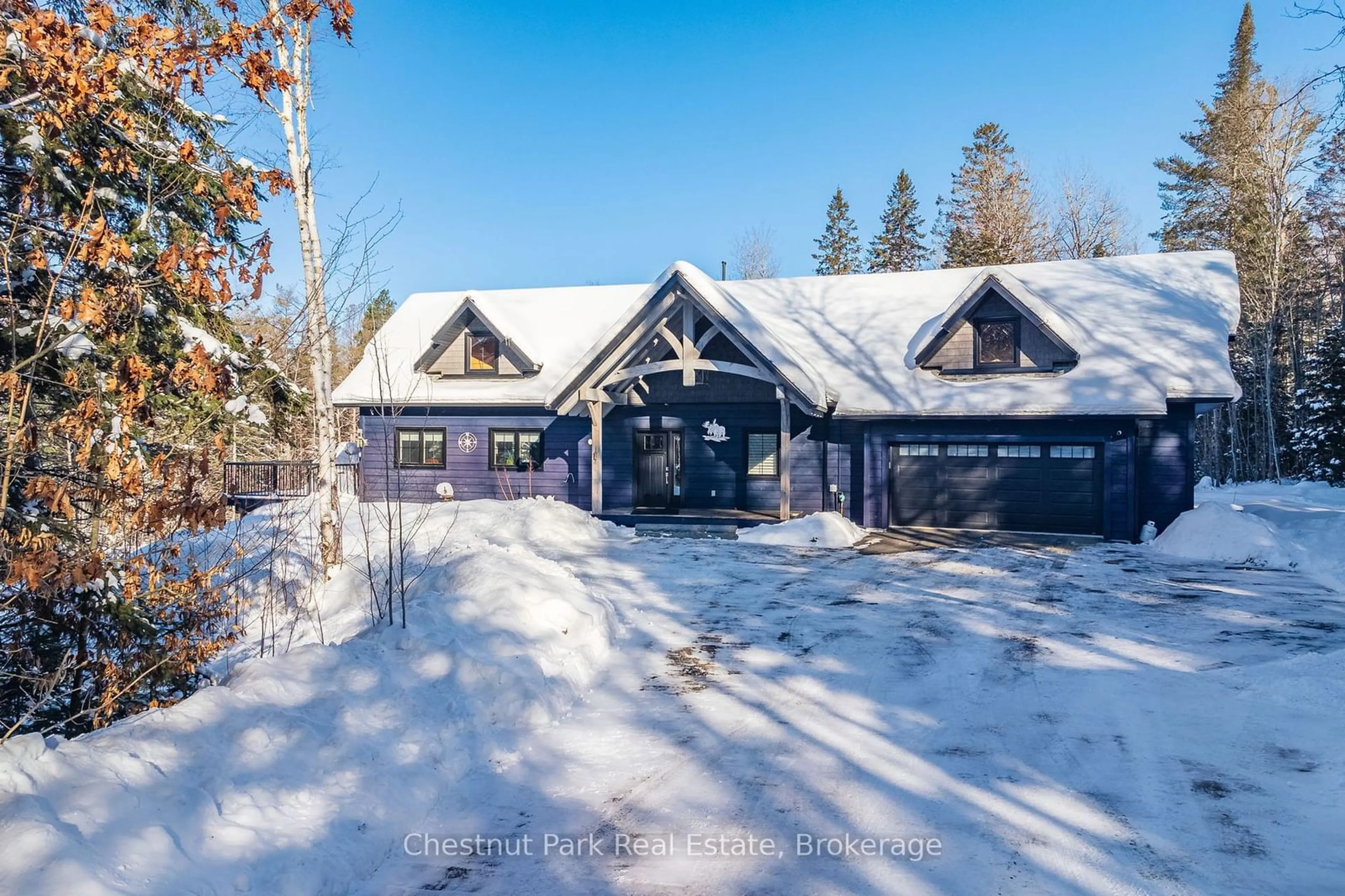 A pic from outside/outdoor area/front of a property/back of a property/a pic from drone, street for 86 BOWYER Rd, Huntsville Ontario P1H 2J4