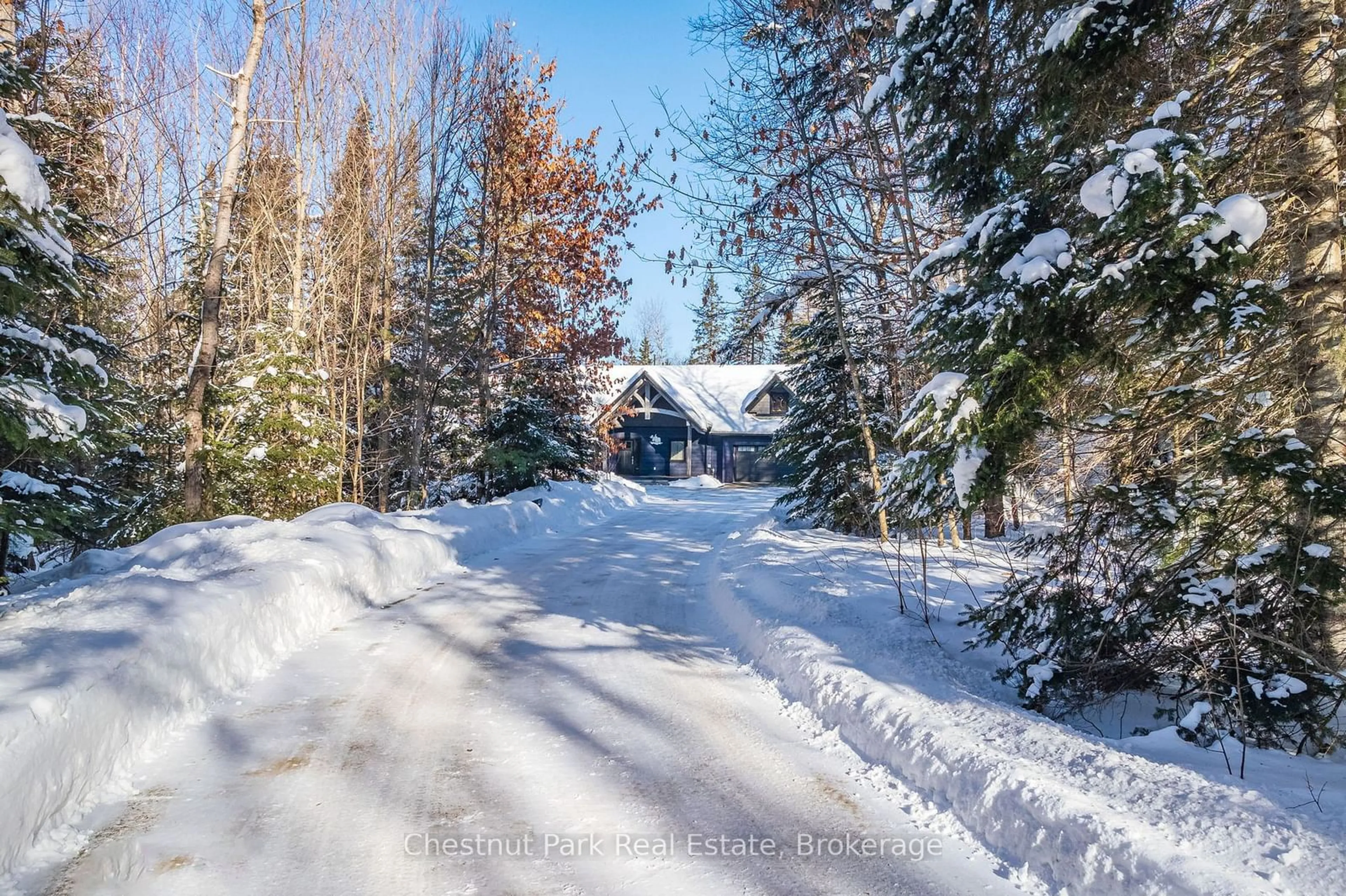 A pic from outside/outdoor area/front of a property/back of a property/a pic from drone, street for 86 BOWYER Rd, Huntsville Ontario P1H 2J4