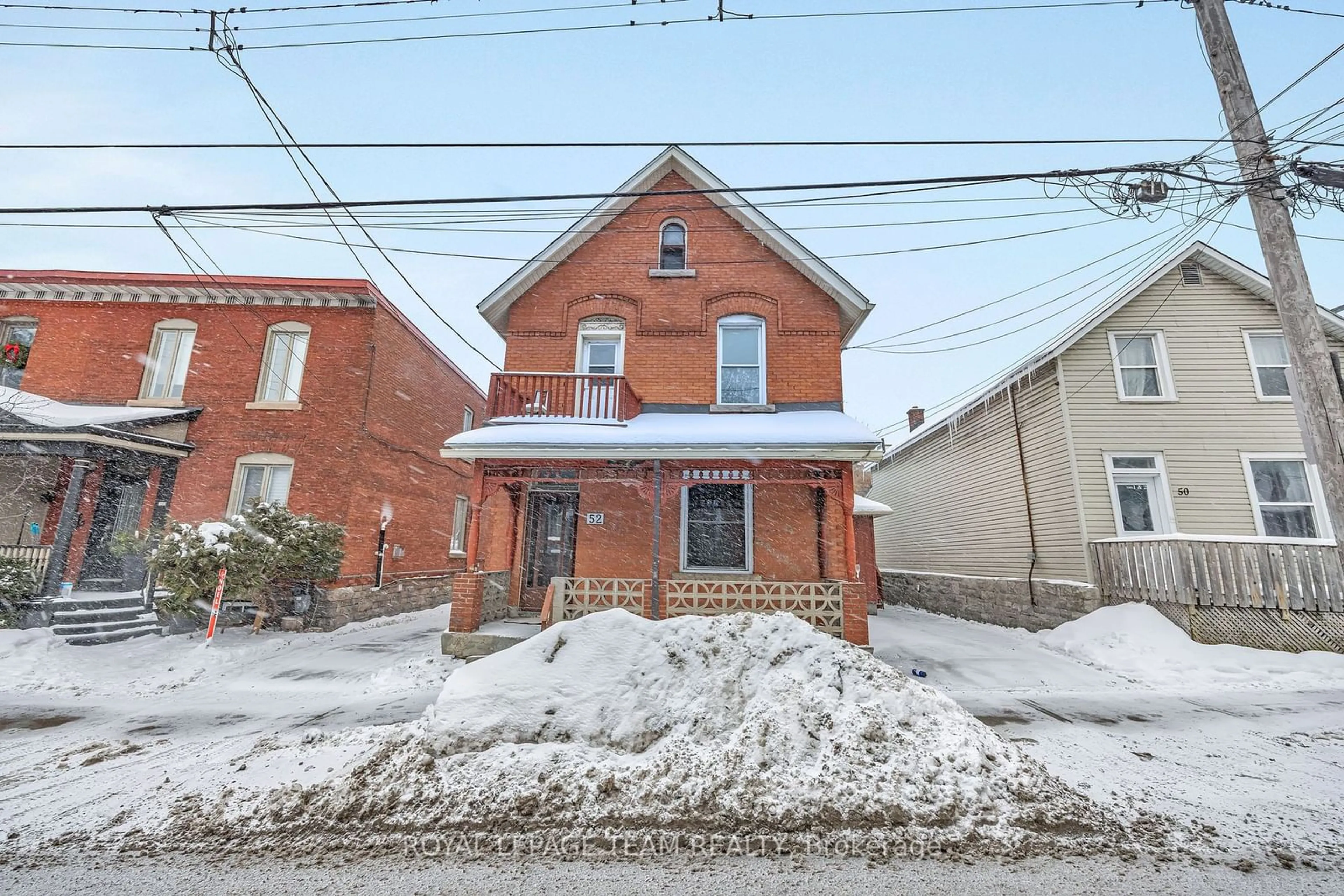 Home with brick exterior material, street for 52 Lees Ave, Glebe - Ottawa East and Area Ontario K1S 0B9