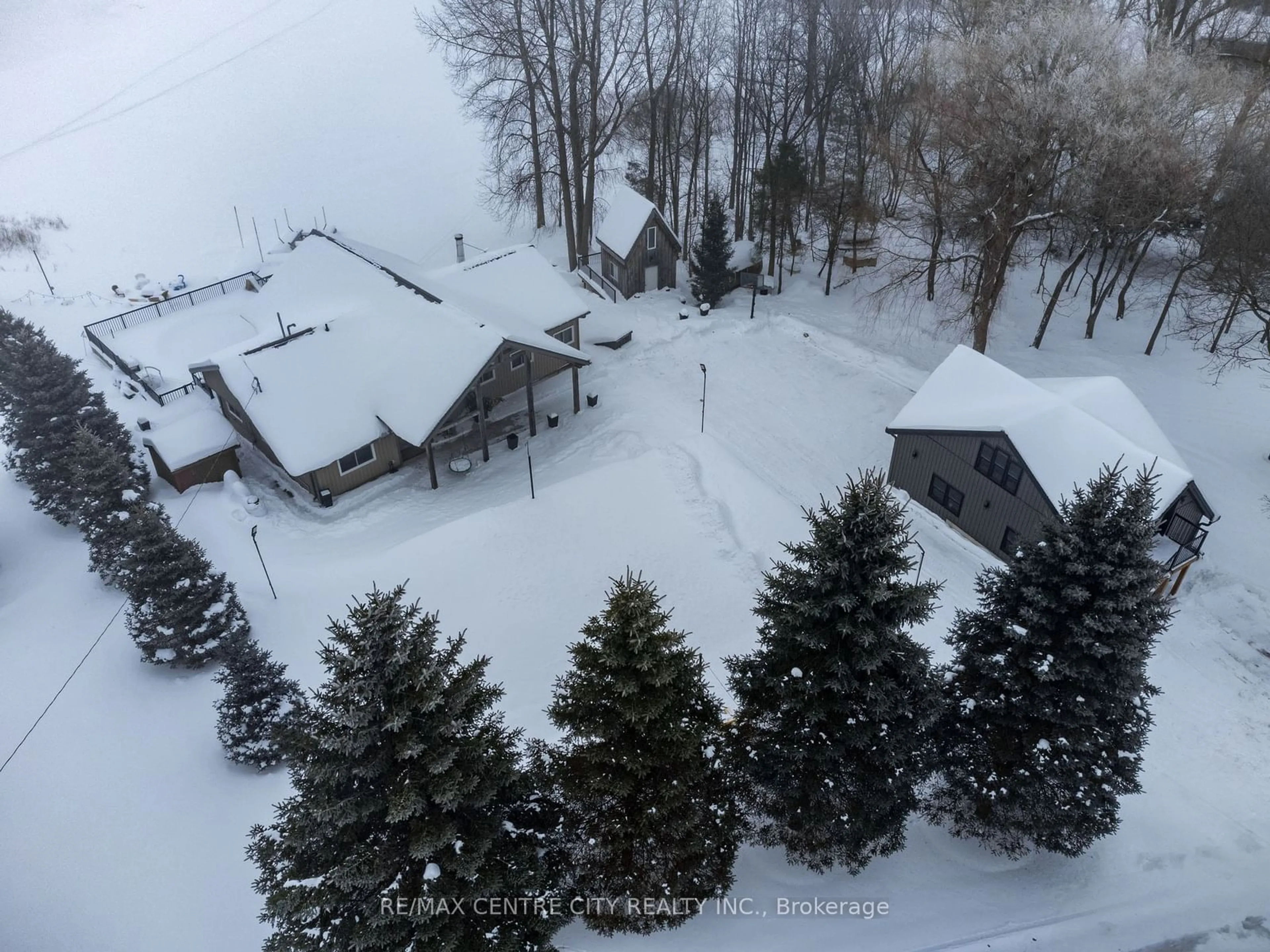 A pic from outside/outdoor area/front of a property/back of a property/a pic from drone, mountain view for 1021 Road 10 East, Mapleton Ontario N0G 1P0