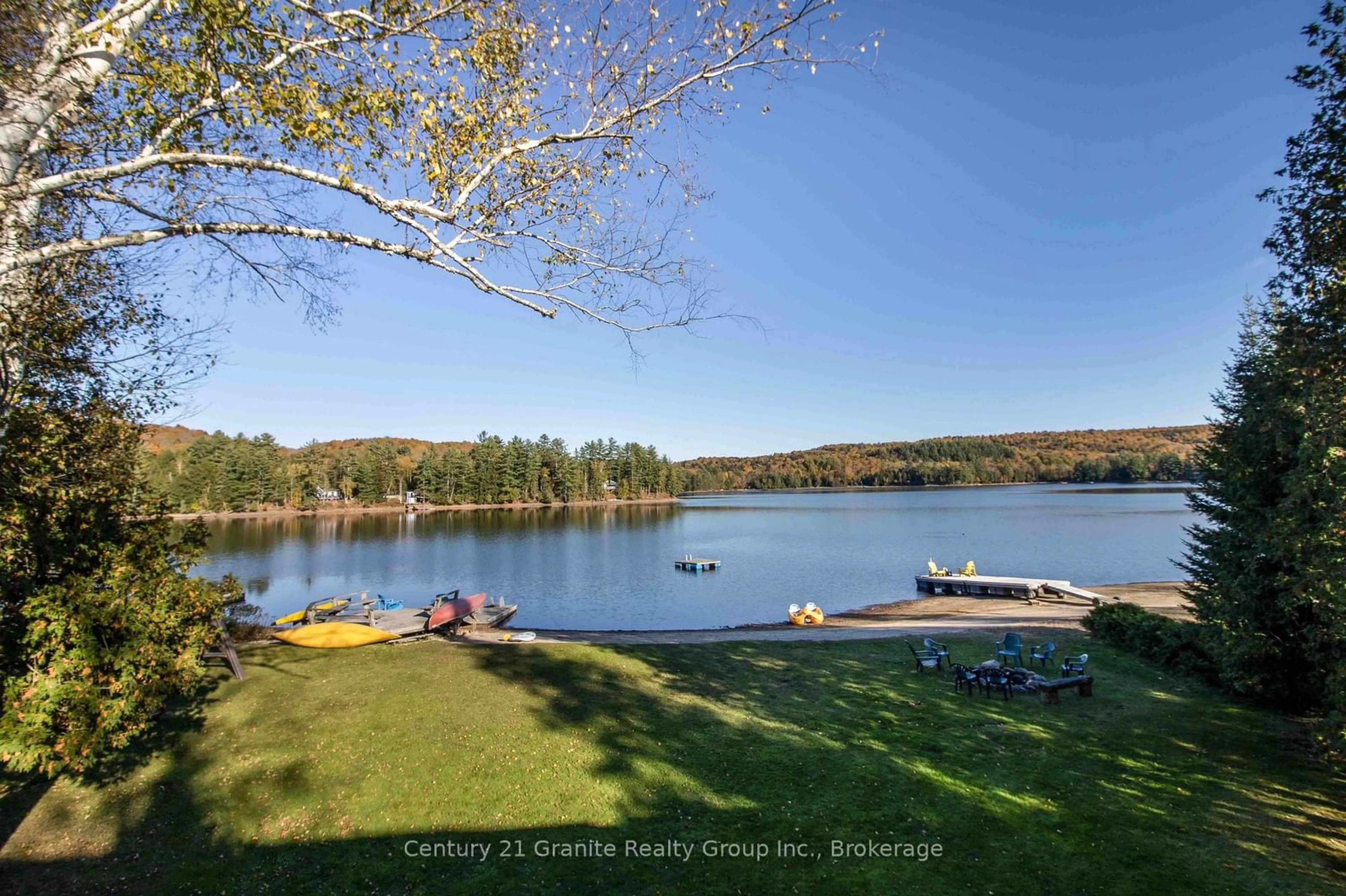 A pic from outside/outdoor area/front of a property/back of a property/a pic from drone, water/lake/river/ocean view for 1317 Sullivan Dr, Dysart et al Ontario K0M 1S0