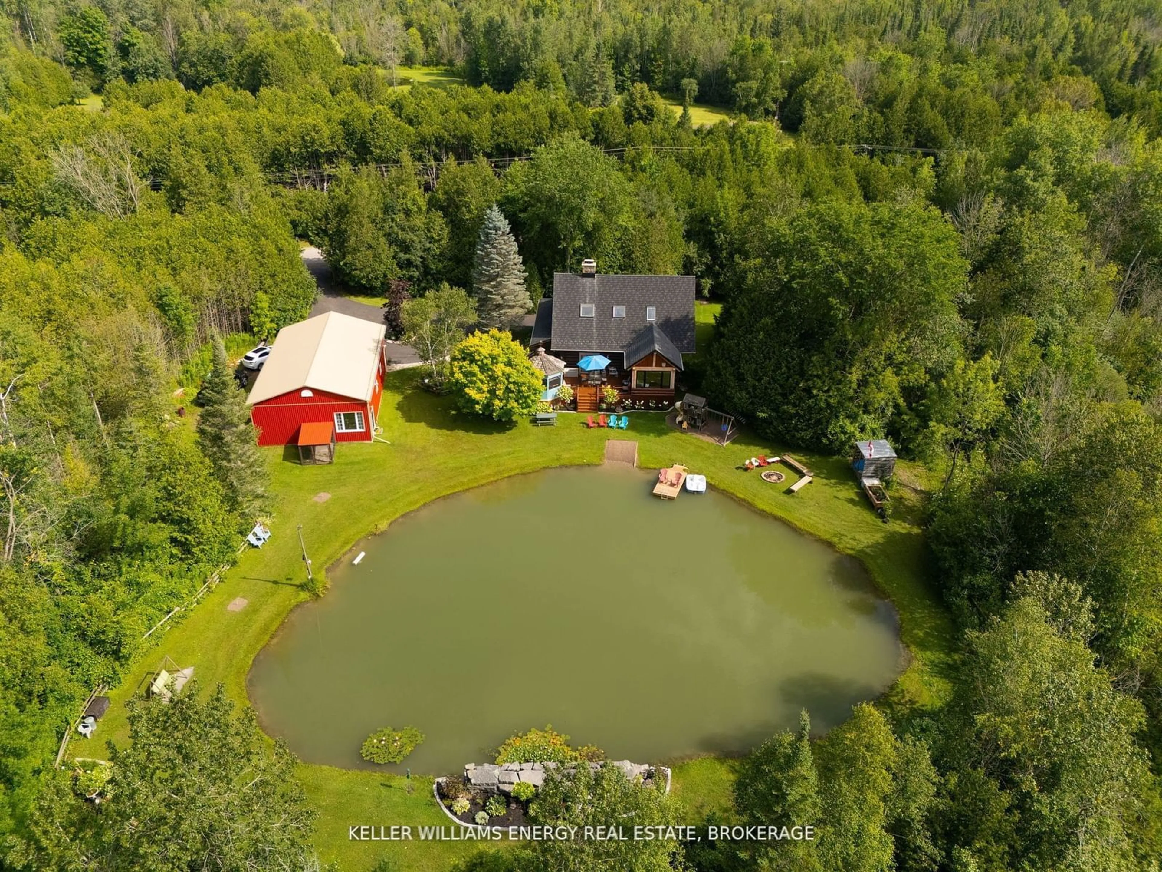 A pic from outside/outdoor area/front of a property/back of a property/a pic from drone, water/lake/river/ocean view for 112 Farmstead Rd, Kawartha Lakes Ontario K0M 2J0