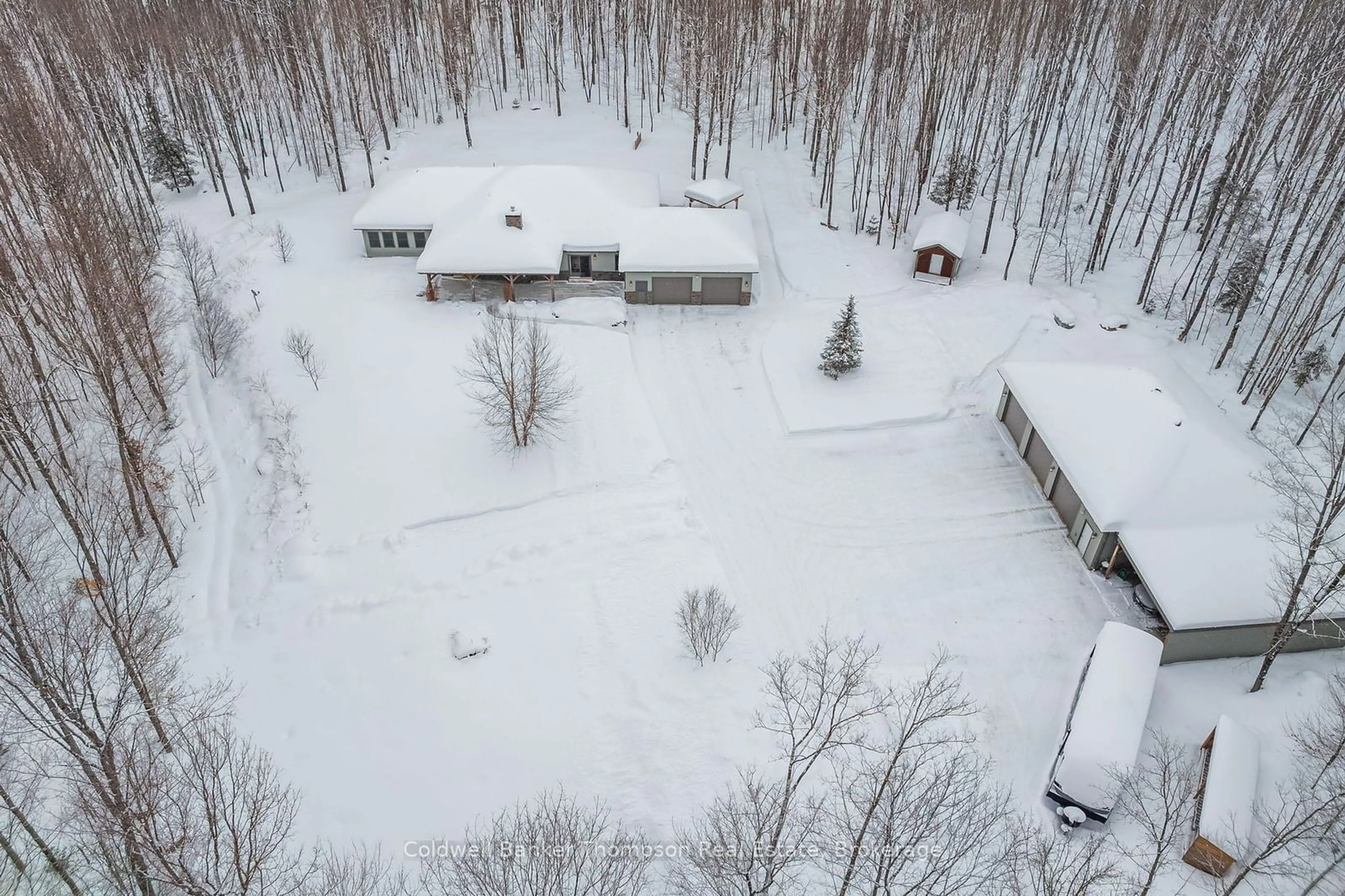 A pic from outside/outdoor area/front of a property/back of a property/a pic from drone, unknown for 291 Mineral Springs Rd, Huntsville Ontario P1H 2N5