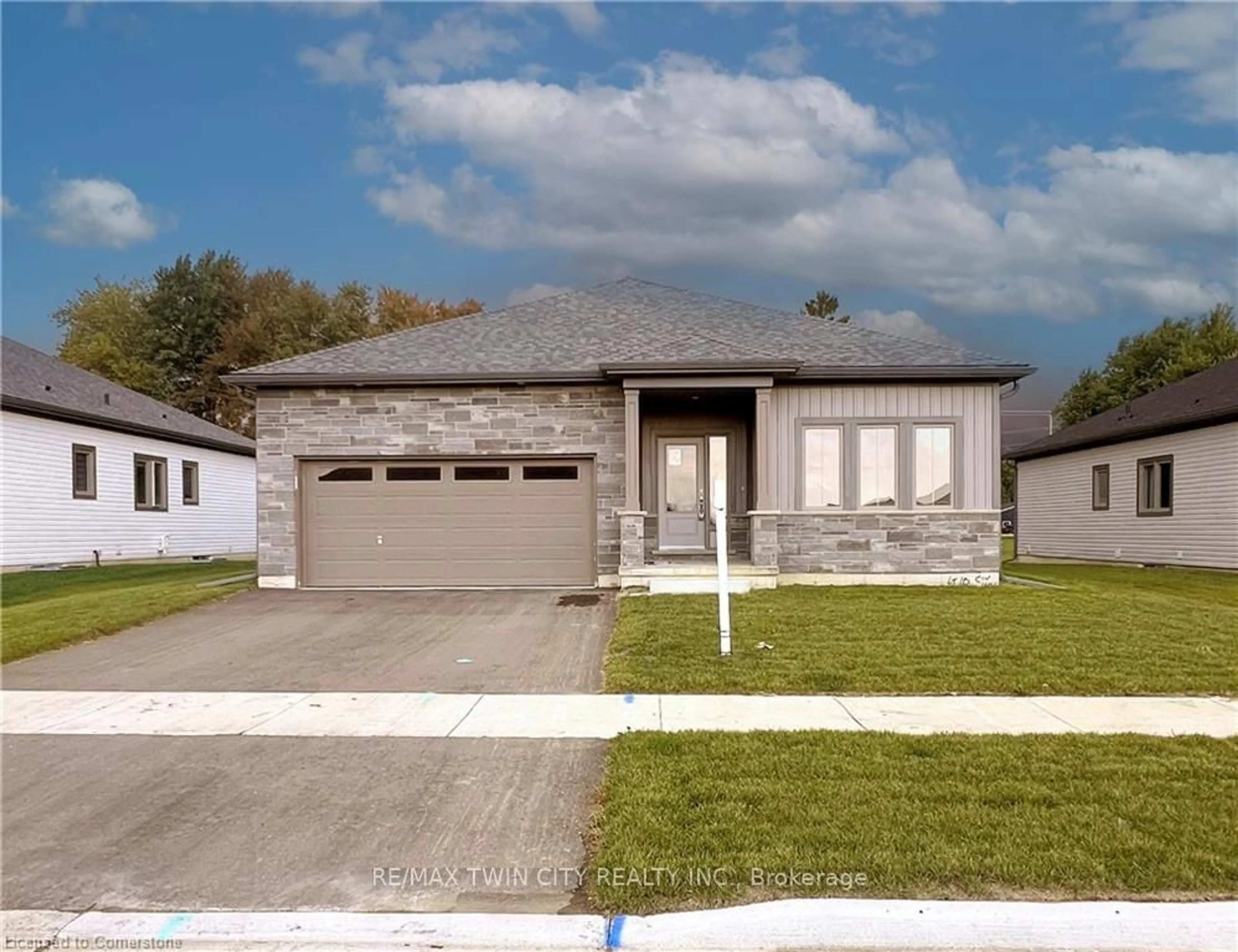 Home with vinyl exterior material, street for 144 Ellen St, North Perth Ontario N0G 1B0