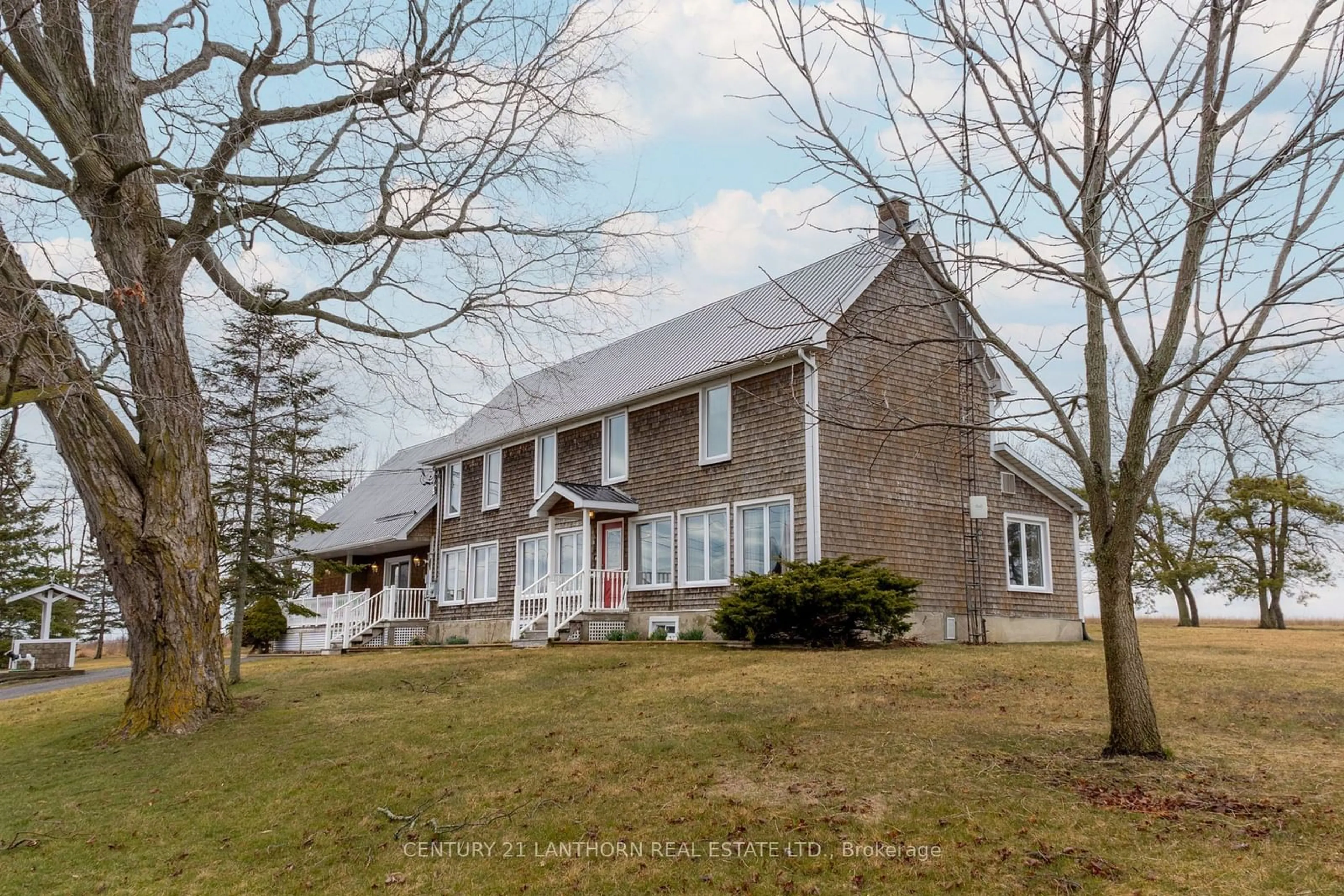 A pic from outside/outdoor area/front of a property/back of a property/a pic from drone, unknown for 338 Cold Creek Rd, Prince Edward County Ontario K0K 3L0