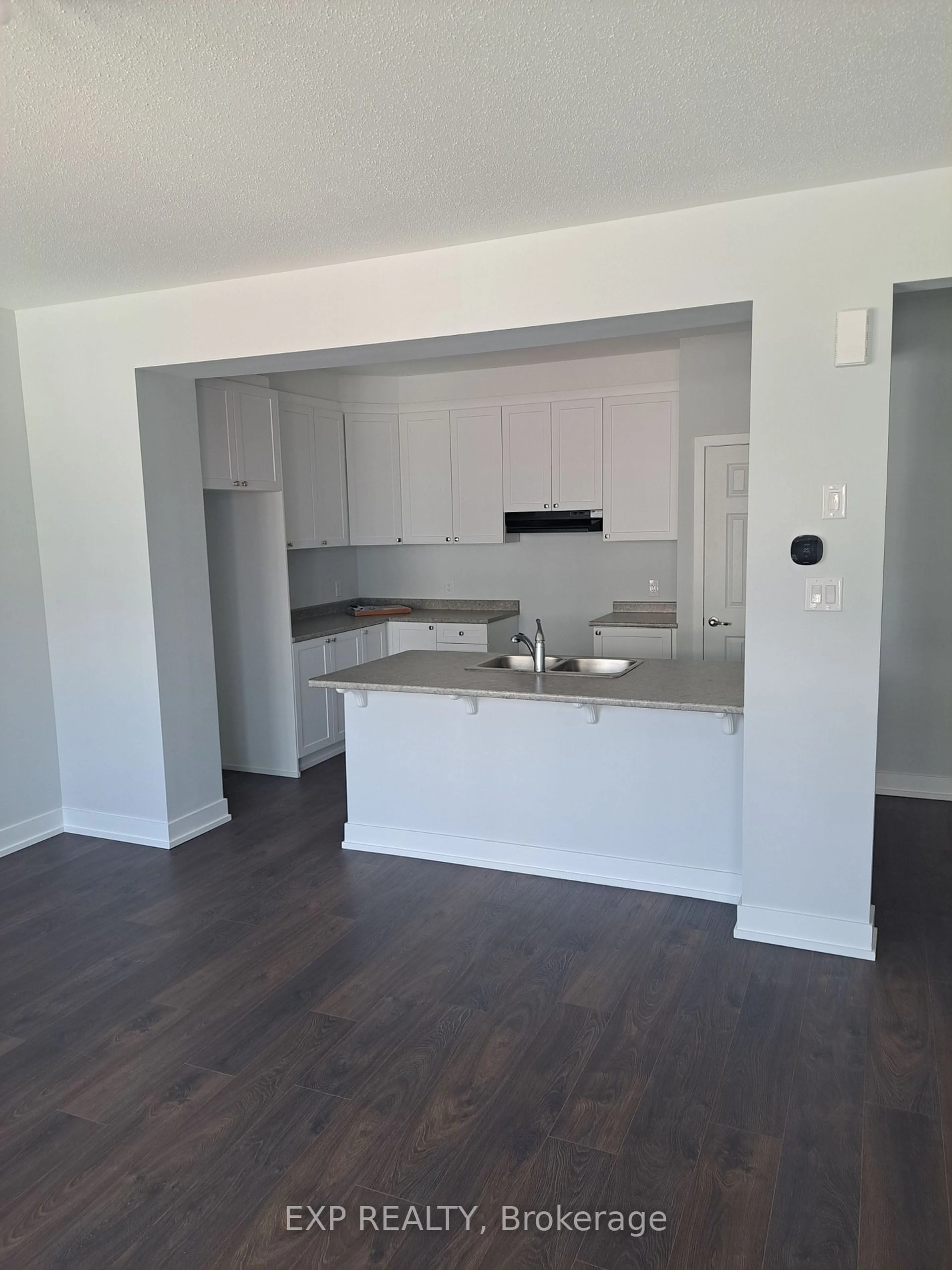 Open concept kitchen, wood/laminate floor for 704 CHROMITE, Barrhaven Ontario K2J 7J2