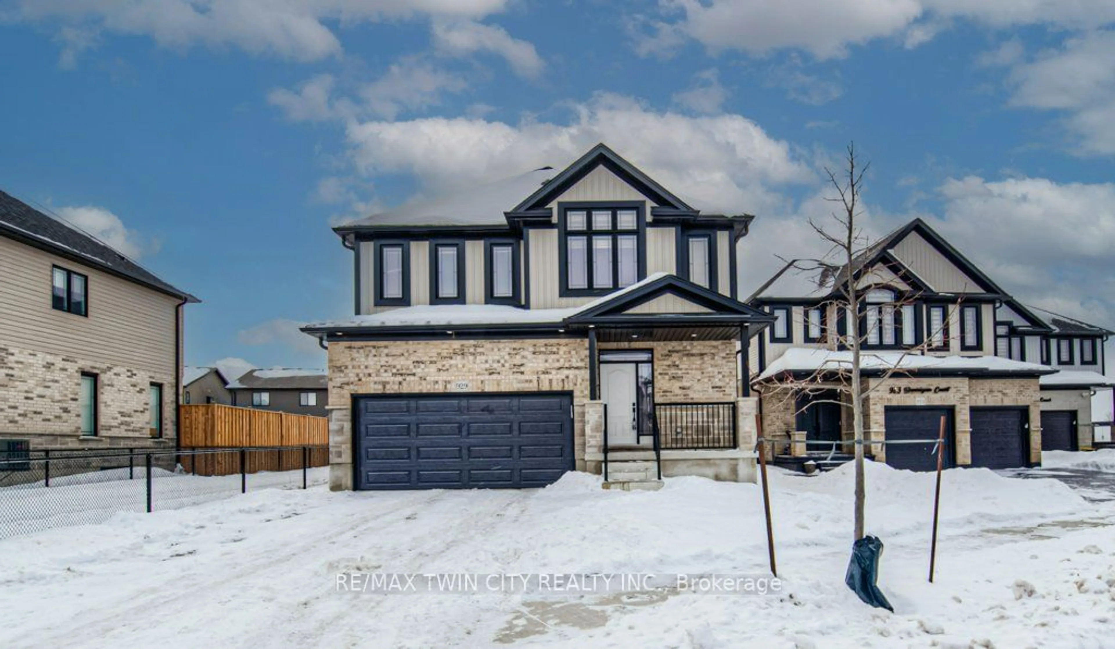 Home with brick exterior material, street for 929 Dunnigan Crt, Kitchener Ontario N2B 0A8