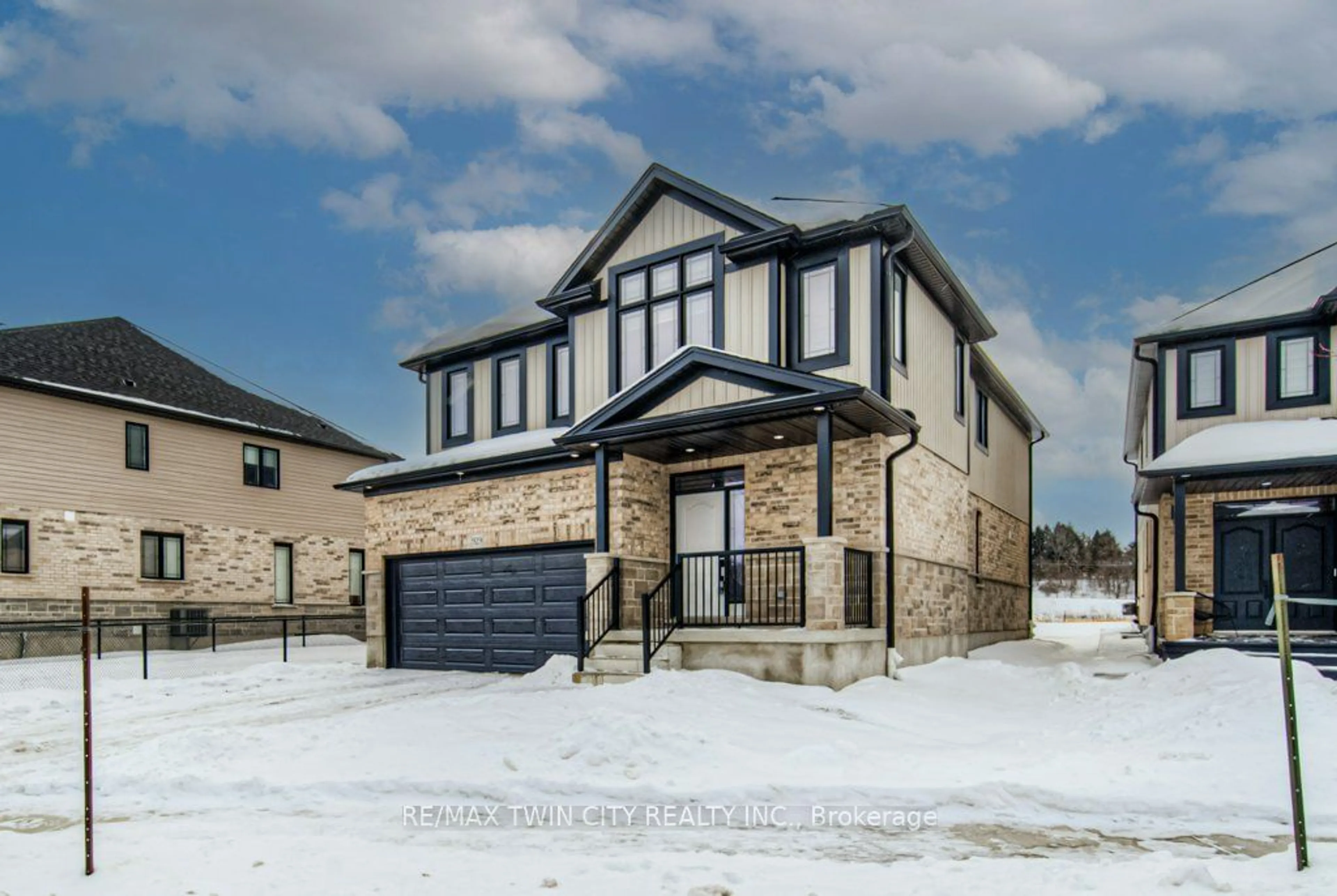 Home with brick exterior material, street for 929 Dunnigan Crt, Kitchener Ontario N2B 0A8