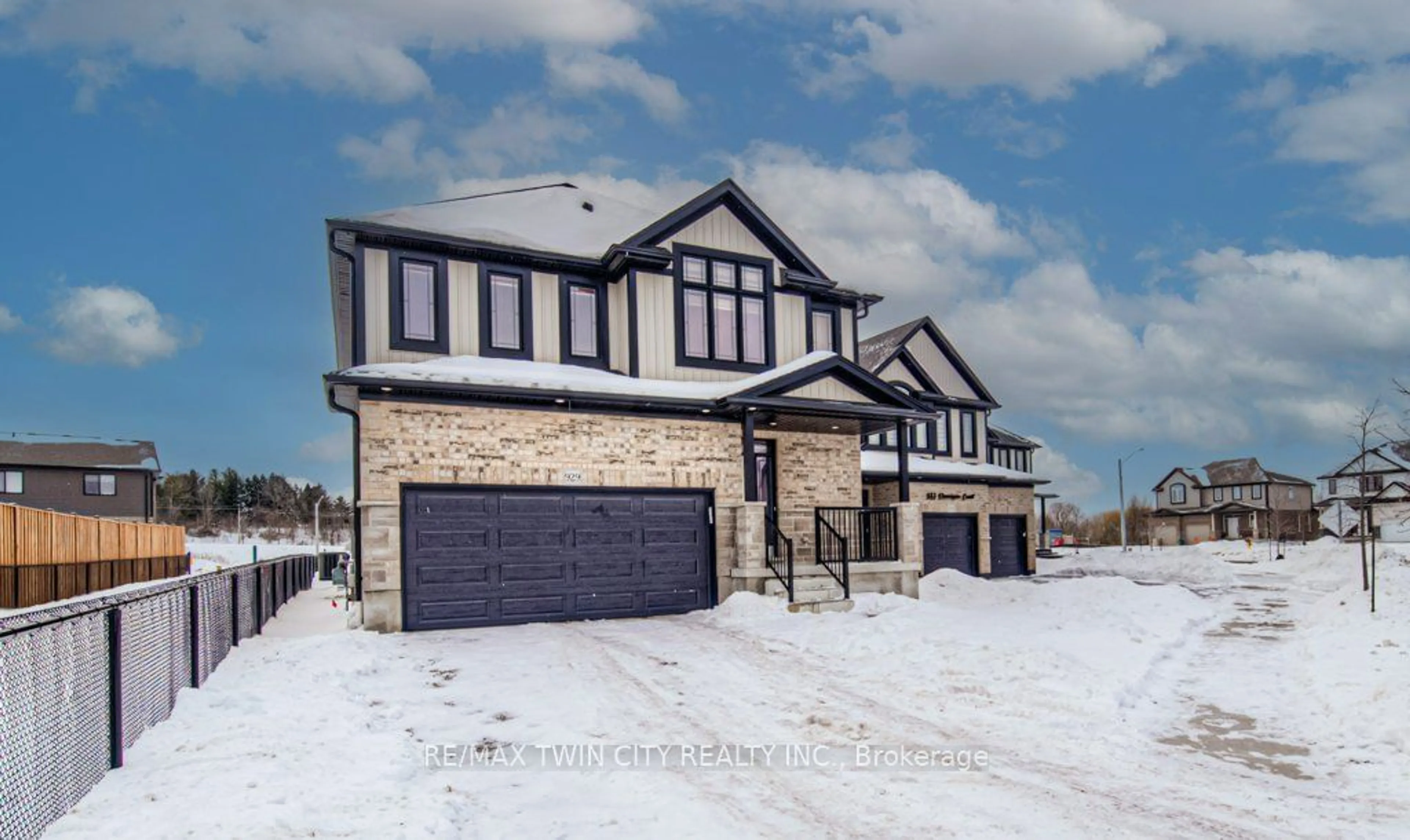 Home with brick exterior material, street for 929 Dunnigan Crt, Kitchener Ontario N2B 0A8