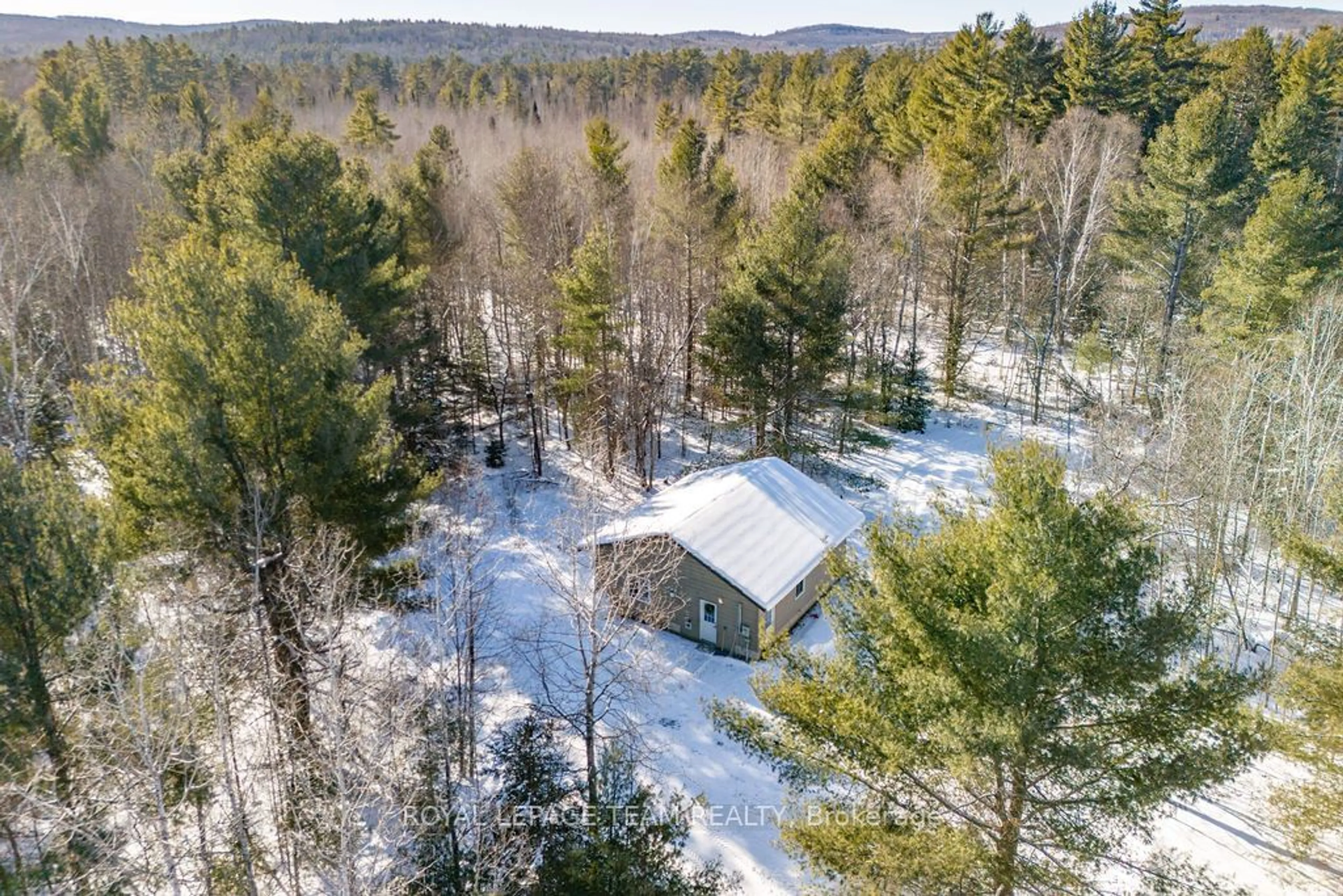 A pic from outside/outdoor area/front of a property/back of a property/a pic from drone, forest/trees view for 32 Fran-Stel Dr, Madawaska Valley Ontario K0J 1L0