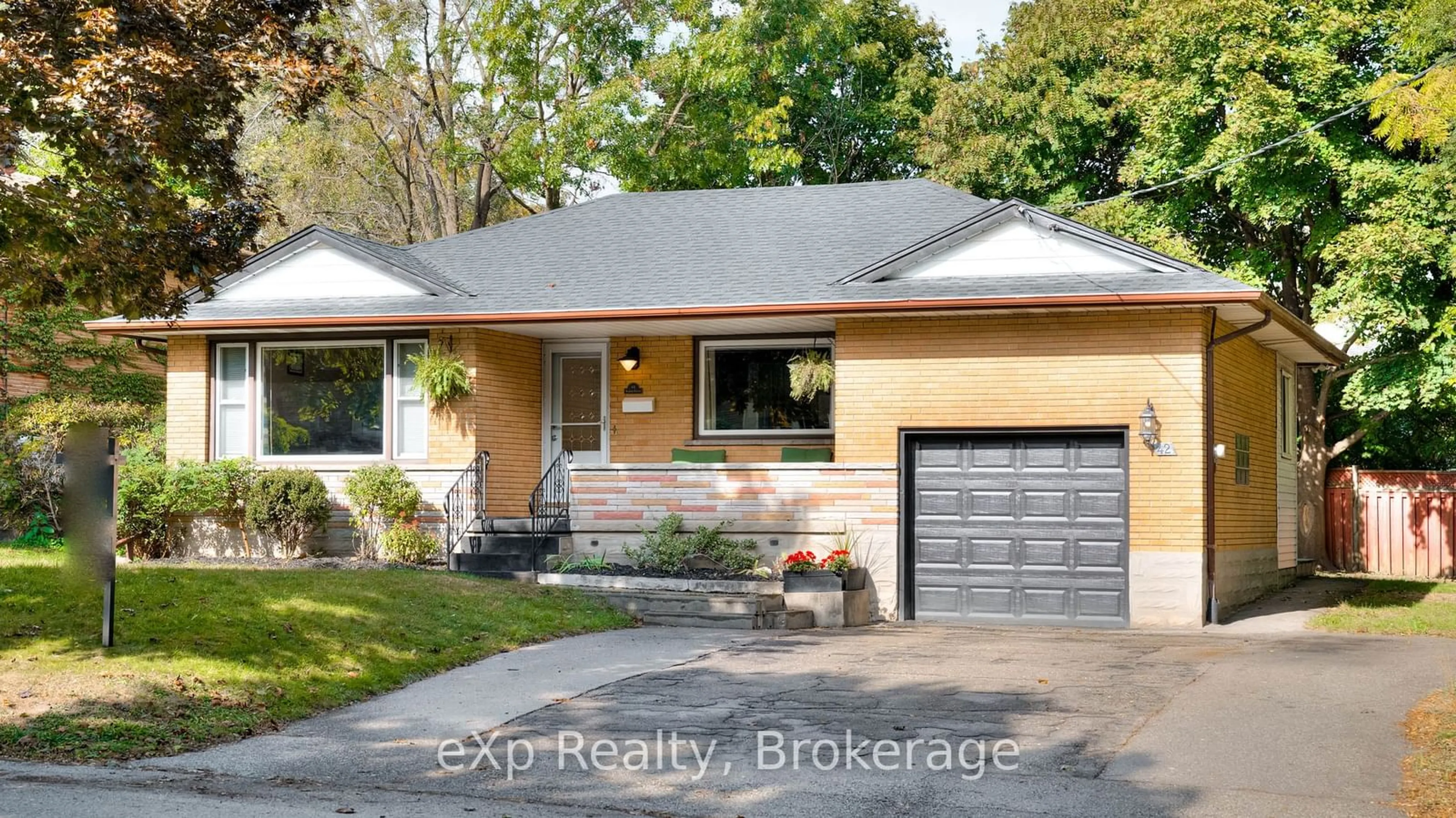 Home with brick exterior material, street for 42 Acacia St, Kitchener Ontario N2G 3B2