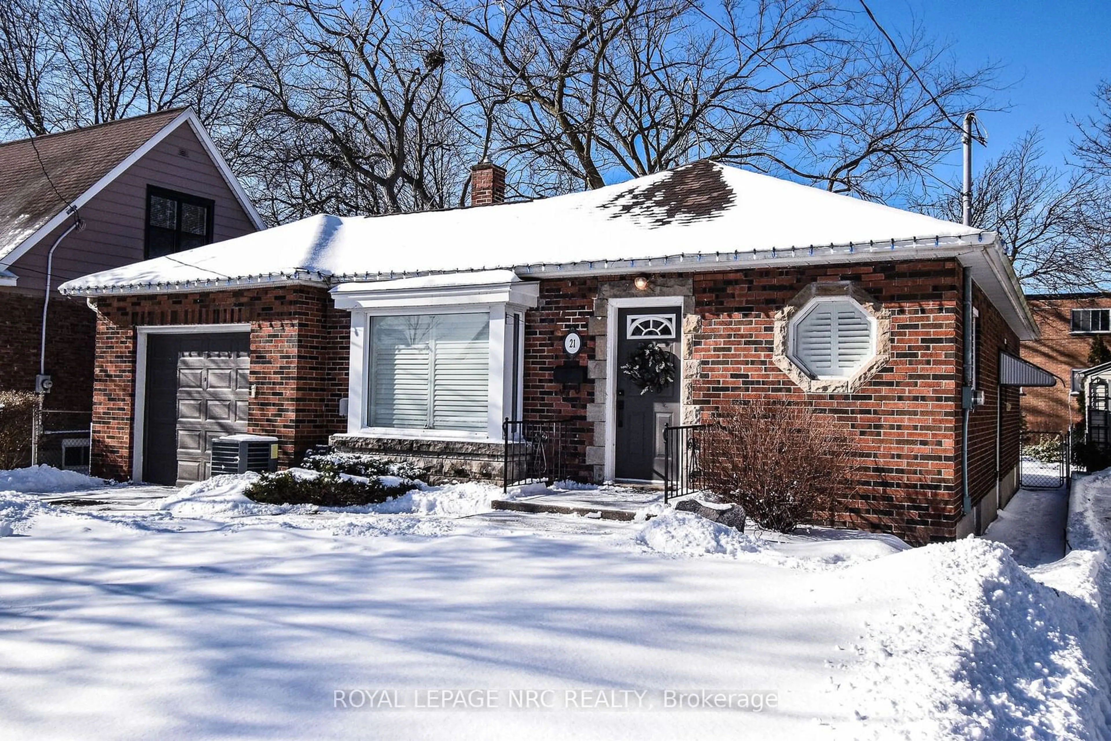 Home with brick exterior material, street for 21 Cameron Rd, St. Catharines Ontario L2P 3E1