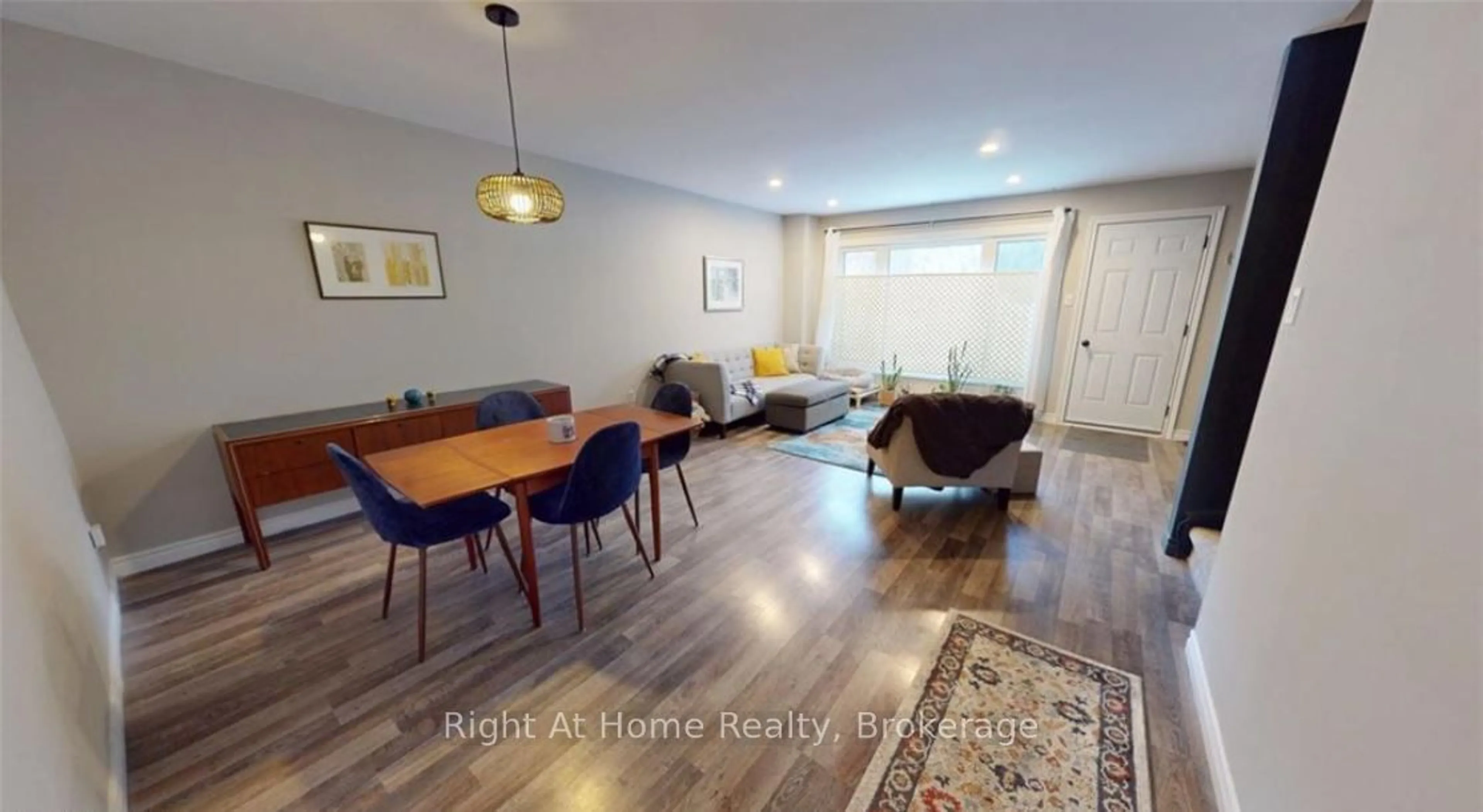 Living room with furniture, wood/laminate floor for 15 Green Valley Dr #49, Kitchener Ontario N2P 1K7