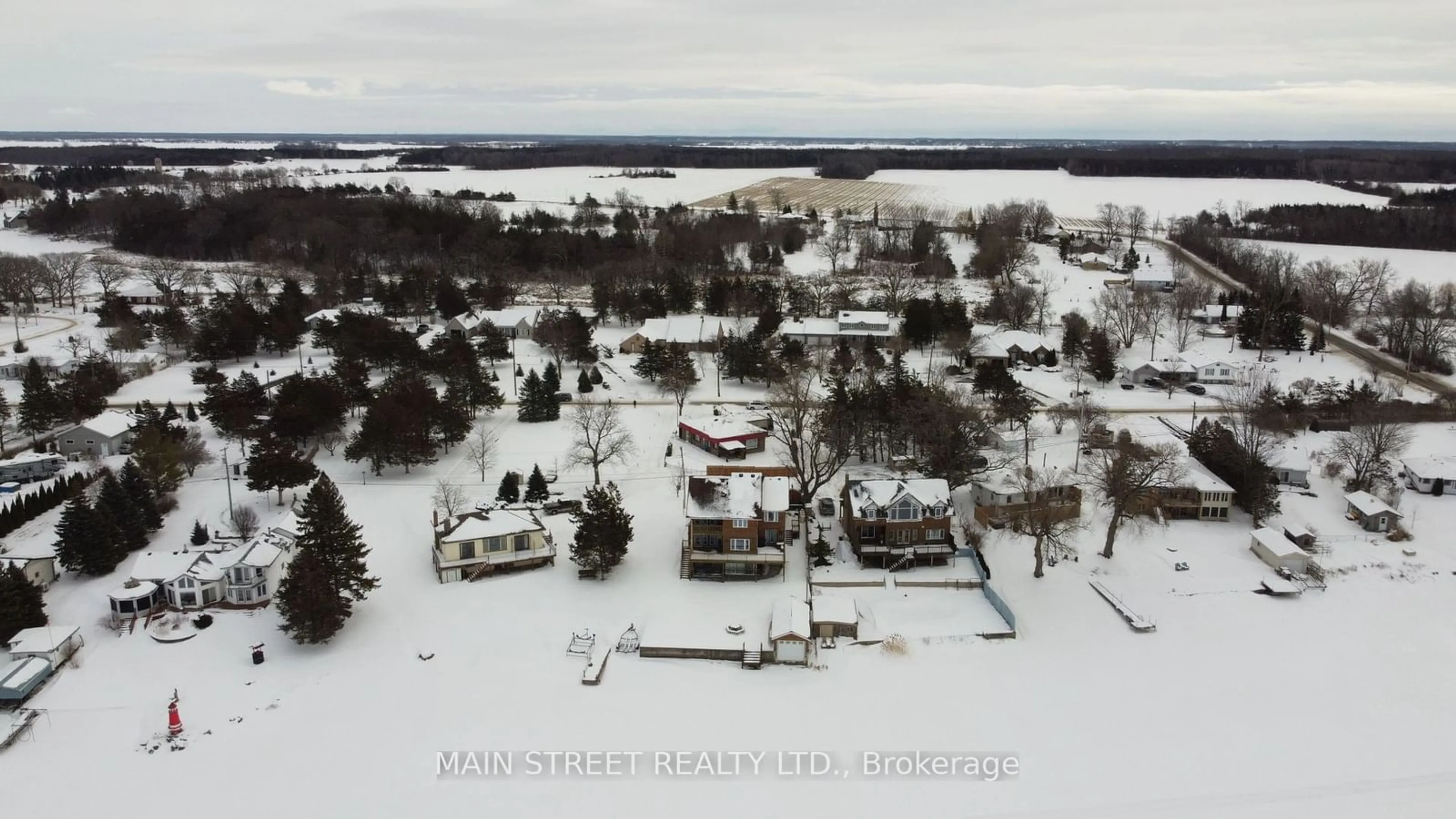 A pic from outside/outdoor area/front of a property/back of a property/a pic from drone, street for 35 Peats Point Rd, Prince Edward County Ontario K8N 4Z7