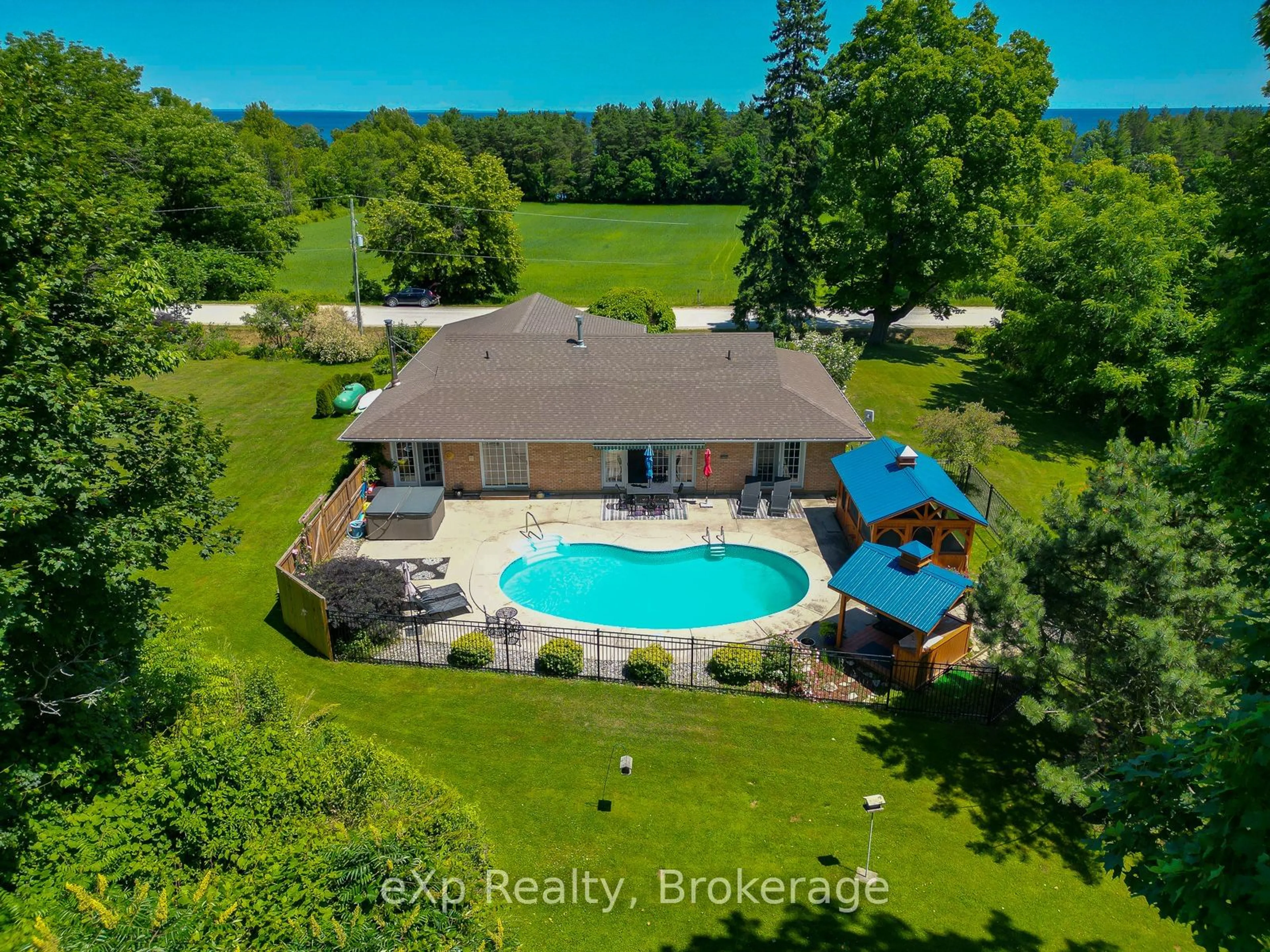 A pic from outside/outdoor area/front of a property/back of a property/a pic from drone, water/lake/river/ocean view for 159046 7th Line, Meaford Ontario N4L 1W5