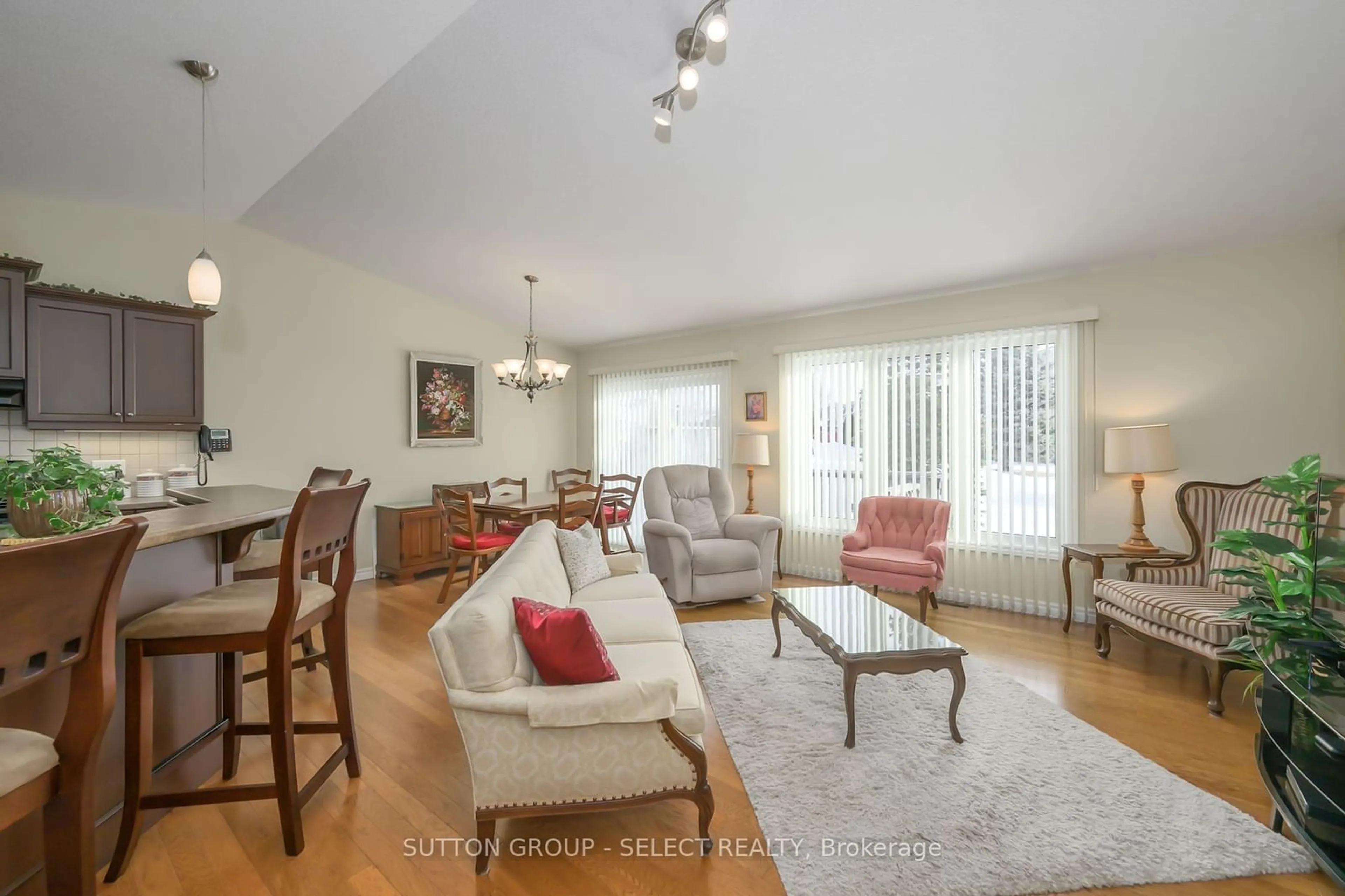 Living room with furniture, wood/laminate floor for 2086 Denview Ave, London Ontario N6G 0J5