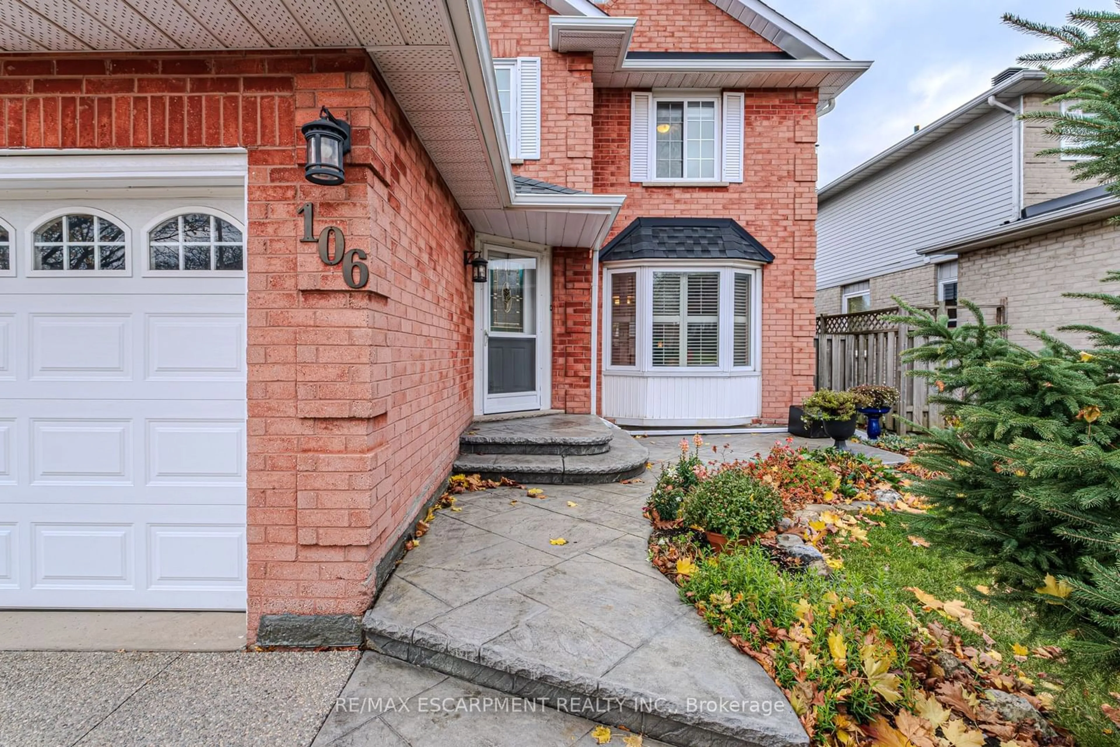 Home with brick exterior material, street for 106 Rushdale Dr, Hamilton Ontario L8W 2Z1