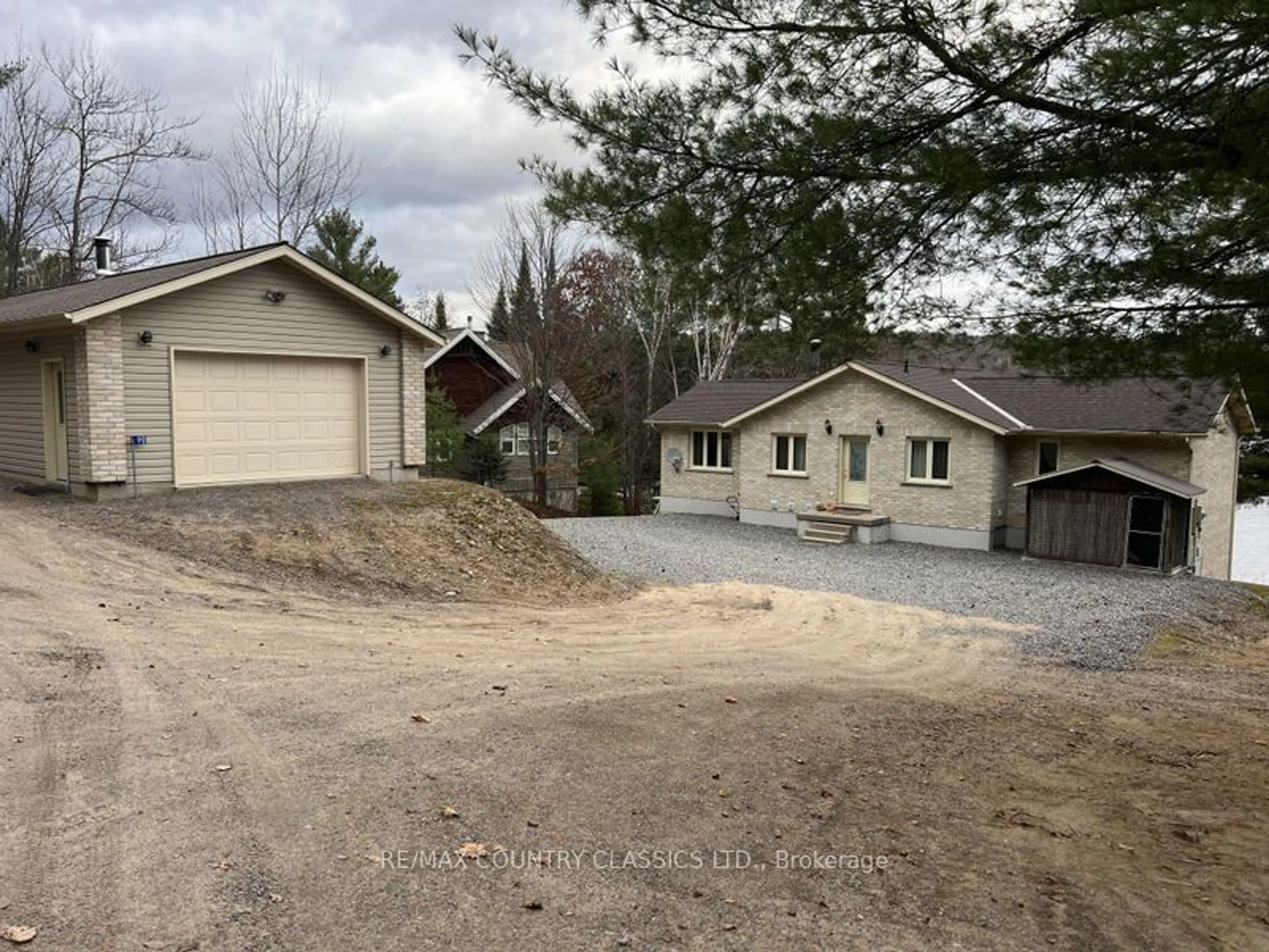 A pic from outside/outdoor area/front of a property/back of a property/a pic from drone, street for 90 Golden Shores Rd, Bancroft Ontario K0L 1C0