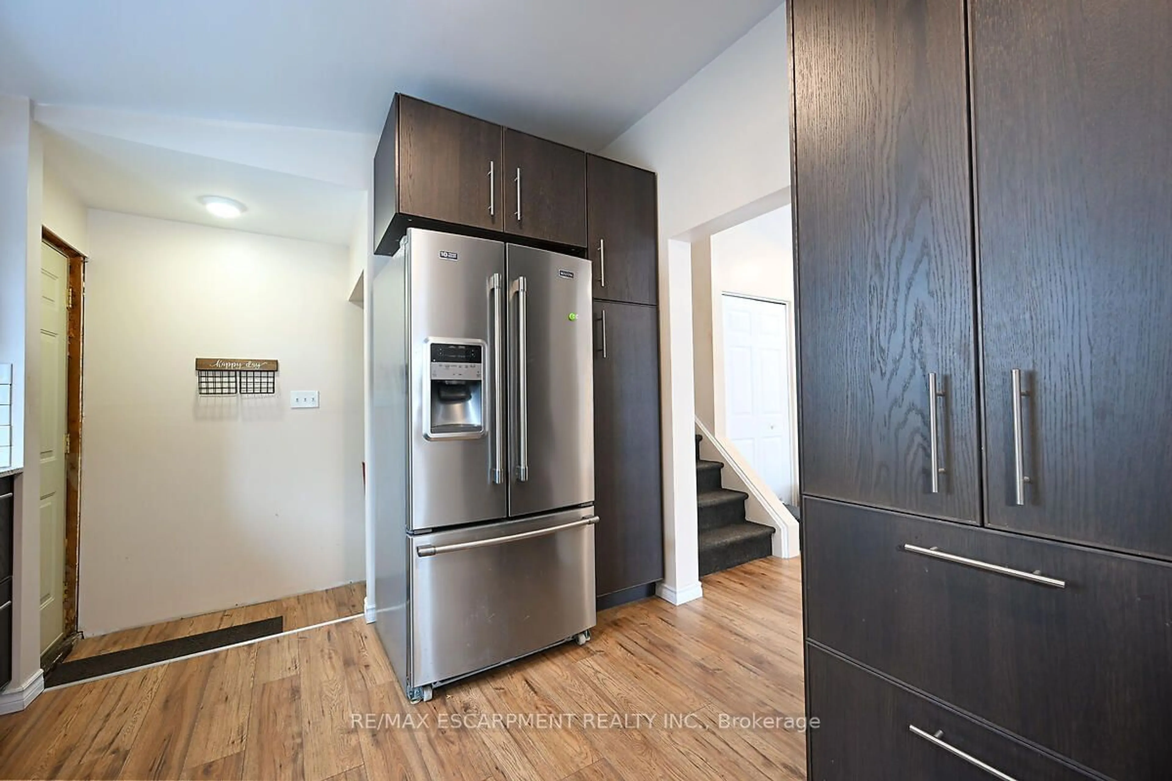 Contemporary kitchen, wood/laminate floor for 105 Lilacside Dr, Hamilton Ontario L8V 2L8