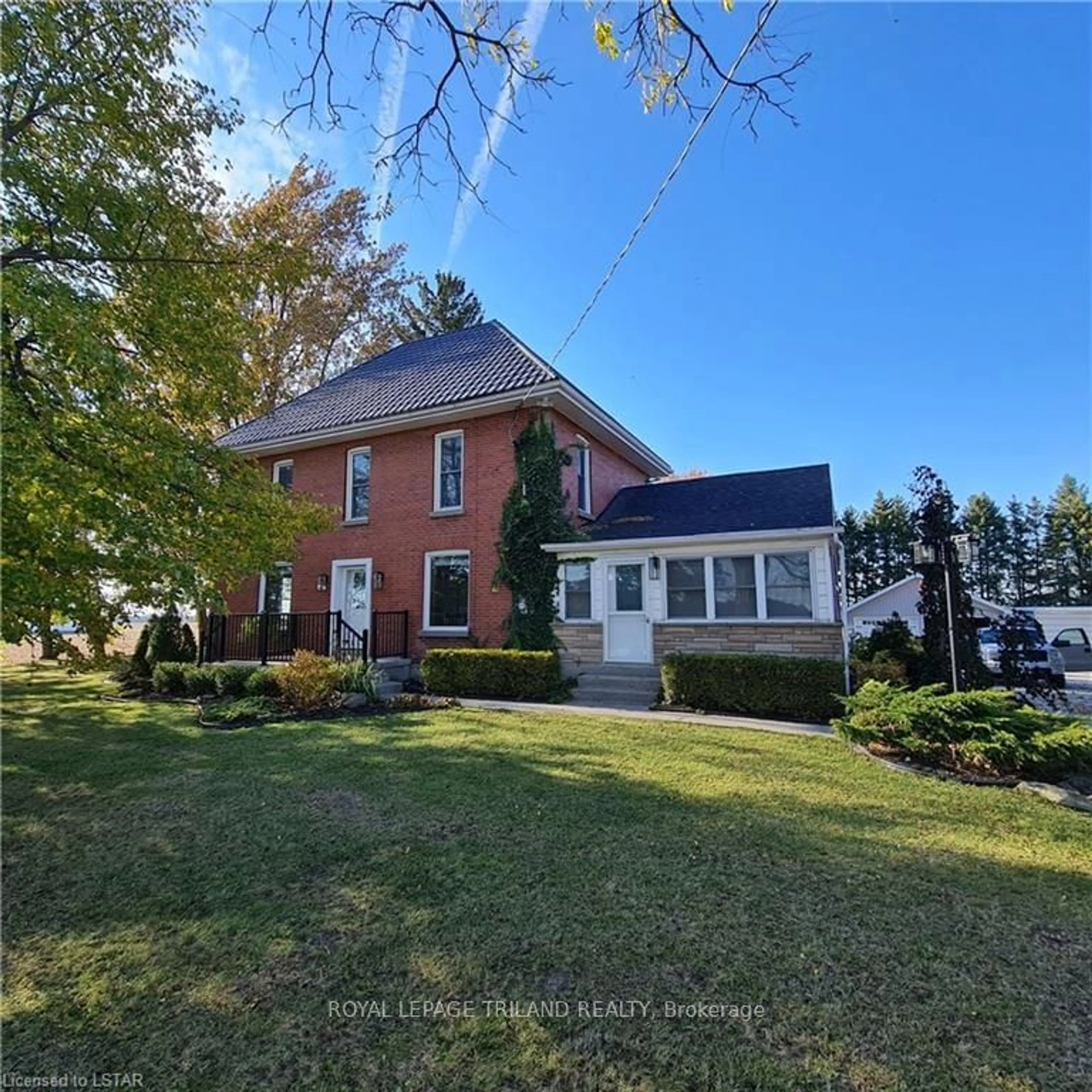 A pic from outside/outdoor area/front of a property/back of a property/a pic from drone, unknown for 11051 Boundary Line, Chatham-Kent Ontario N0P 1V0