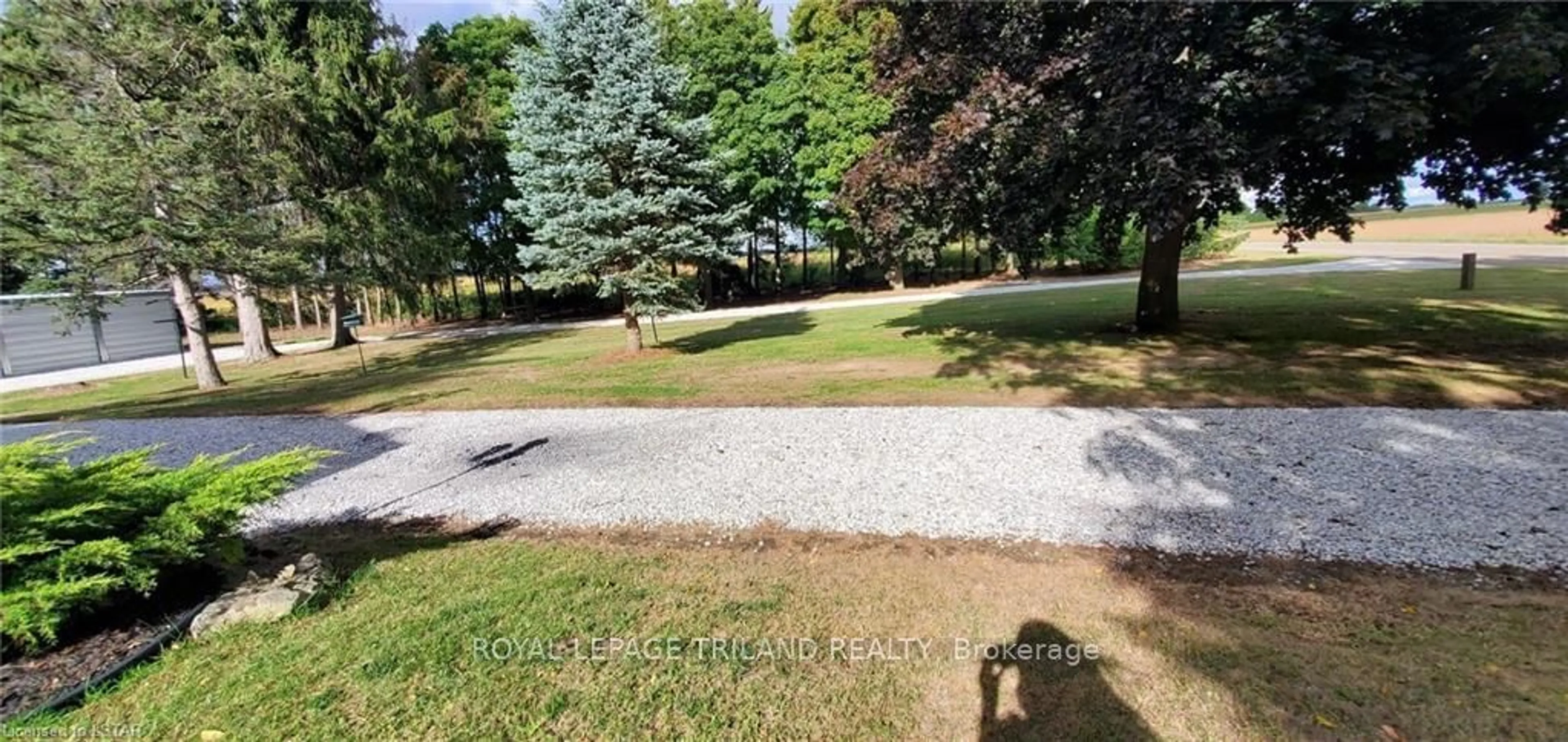 A pic from outside/outdoor area/front of a property/back of a property/a pic from drone, unknown for 11051 Boundary Line, Chatham-Kent Ontario N0P 1V0