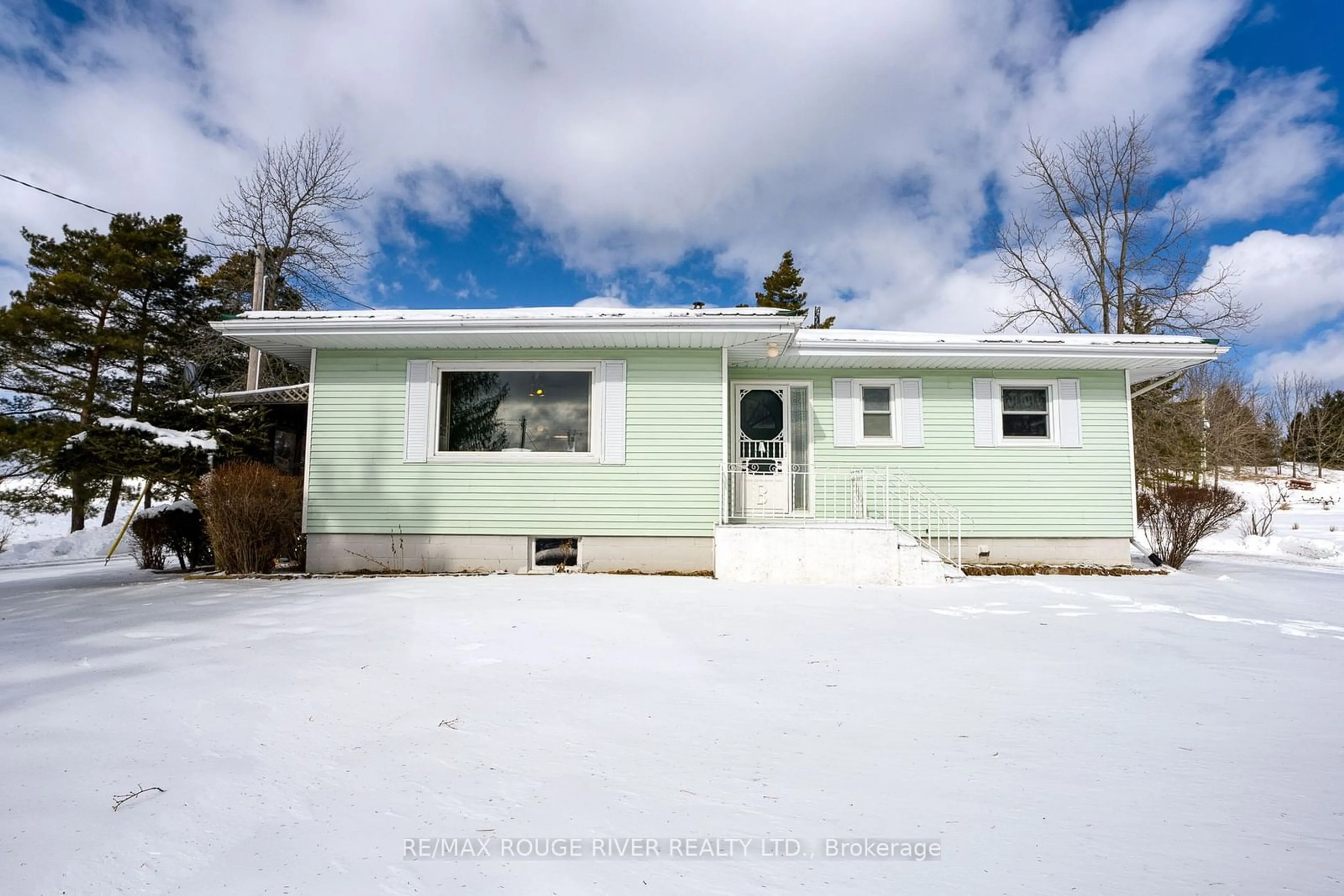 Home with vinyl exterior material, street for 1017 S. Big Island Rd, Prince Edward County Ontario K0K 1W0