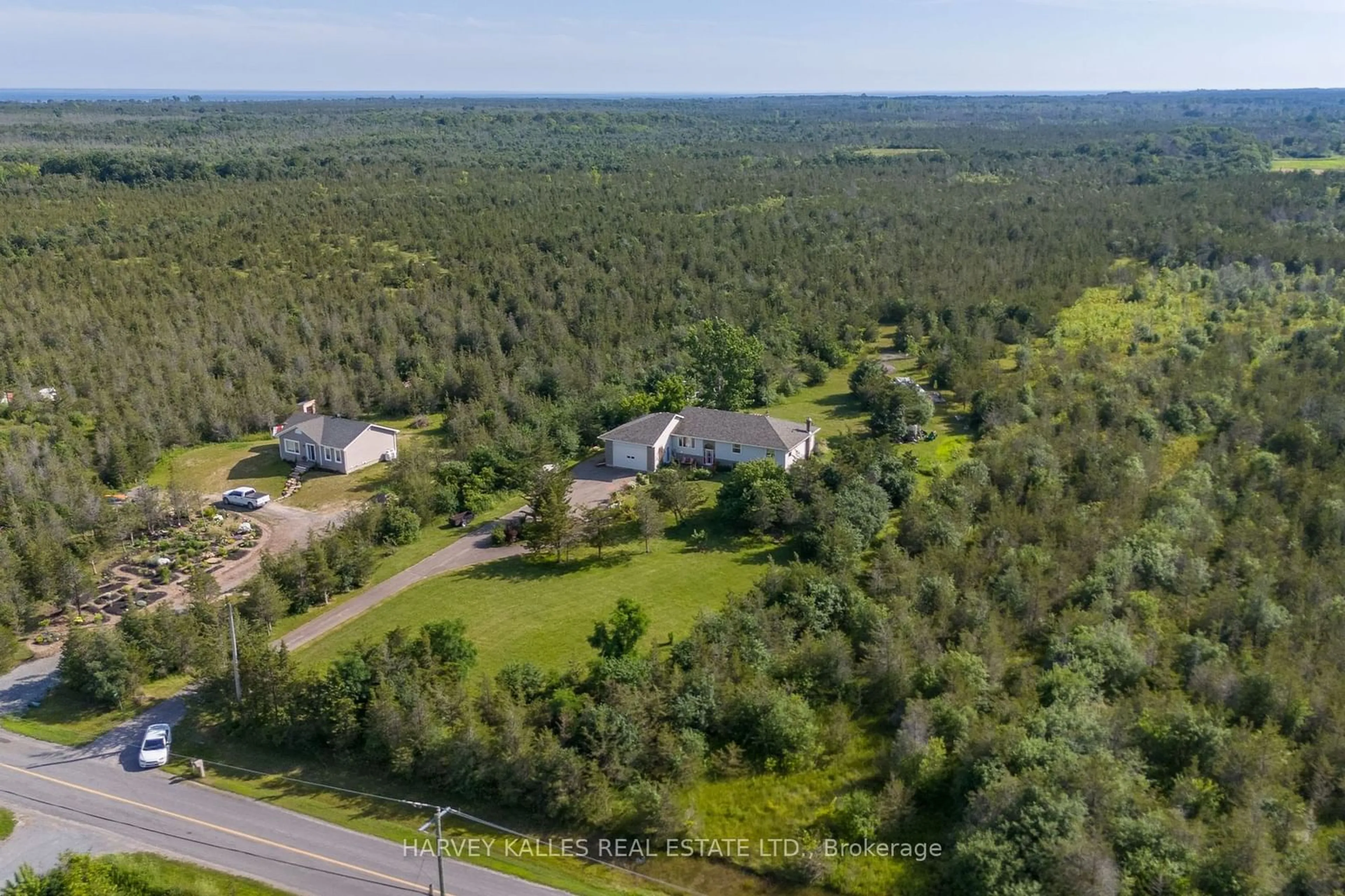 A pic from outside/outdoor area/front of a property/back of a property/a pic from drone, forest/trees view for 3470 County Rd 13 Rd, Prince Edward County Ontario K0K 2T0