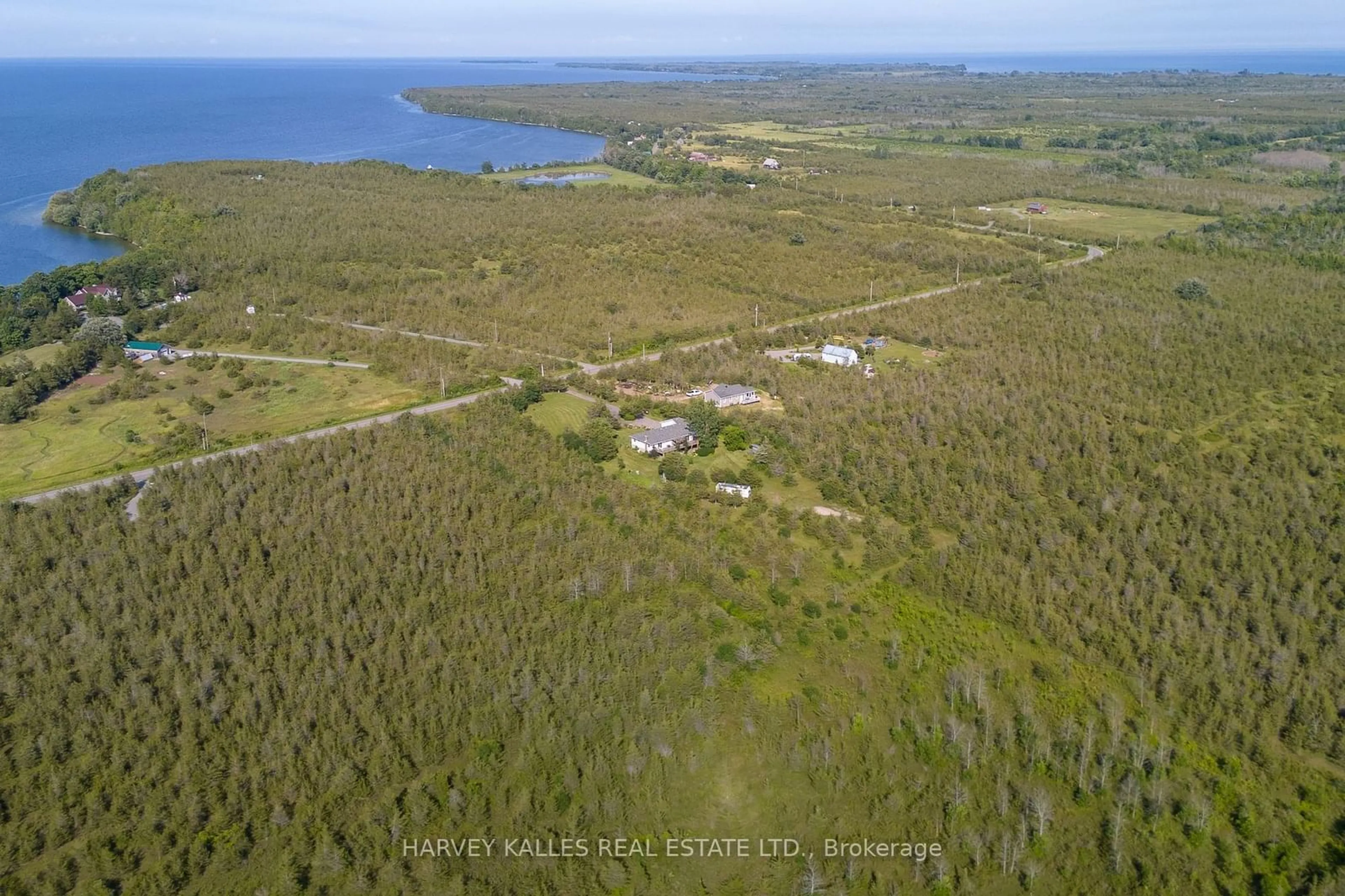 A pic from outside/outdoor area/front of a property/back of a property/a pic from drone, water/lake/river/ocean view for 3470 County Rd 13 Rd, Prince Edward County Ontario K0K 2T0